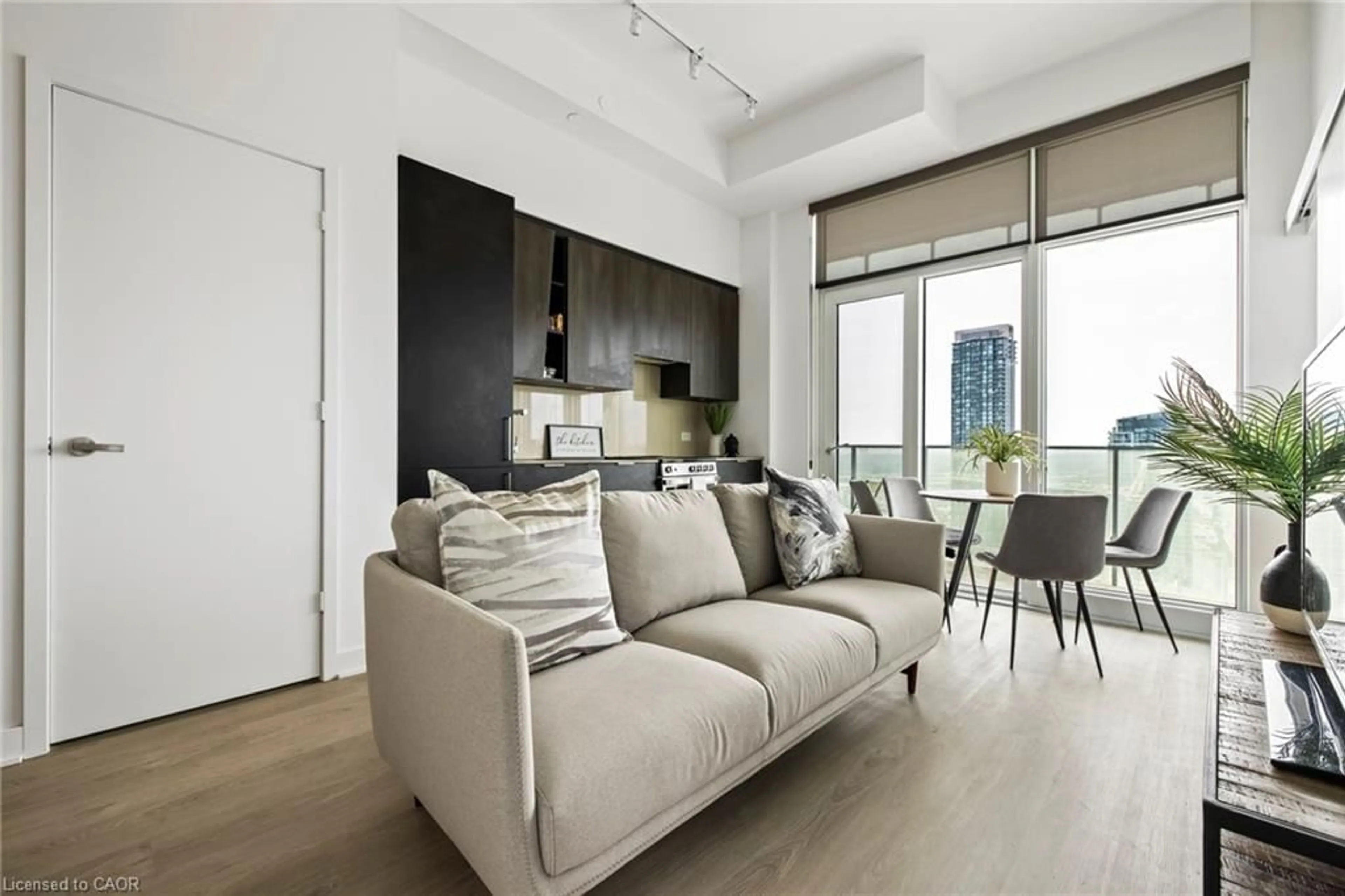 Living room with furniture, unknown for 3900 Confederation Pky #2408, Mississauga Ontario L5B 0M3