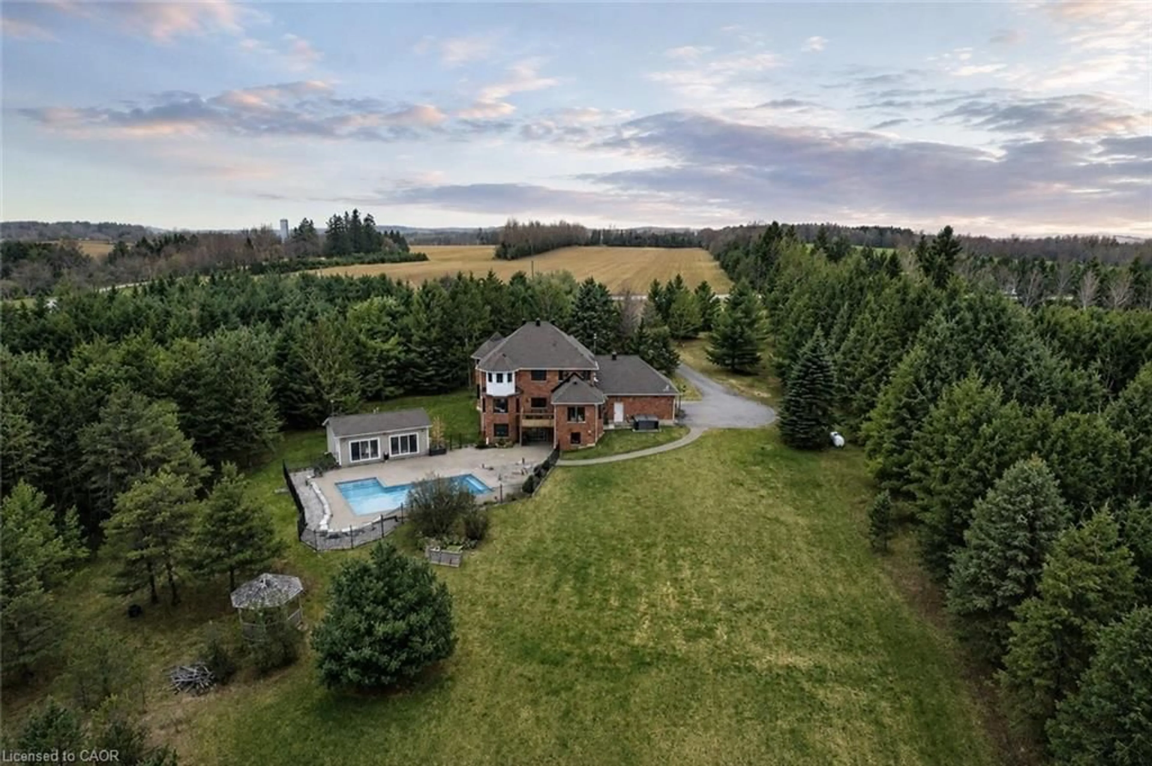 A pic from outside/outdoor area/front of a property/back of a property/a pic from drone, mountain view for 9343 Wellington Rd 22, Wellington Ontario N0B 1Z0