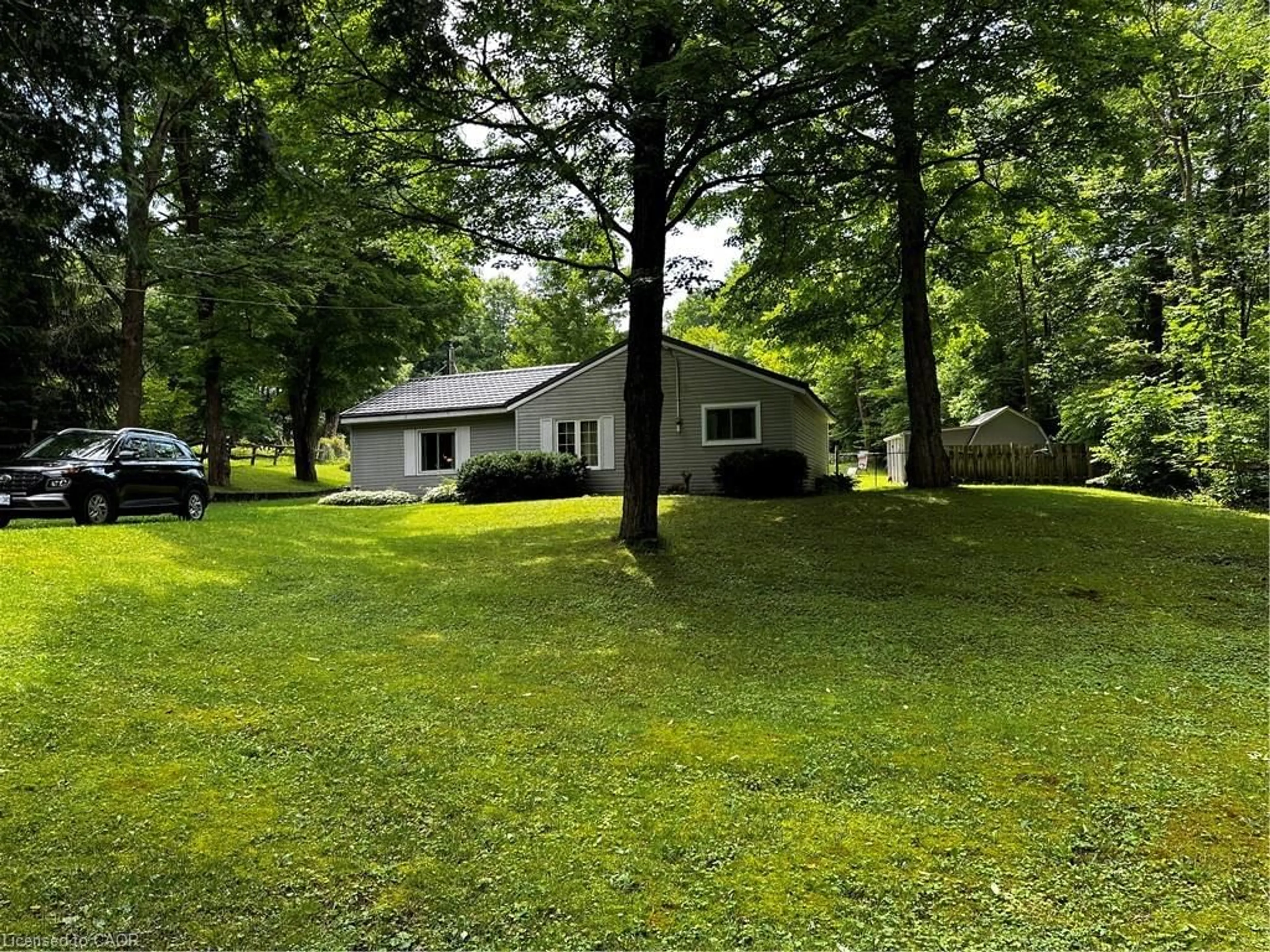 A pic from outside/outdoor area/front of a property/back of a property/a pic from drone, forest/trees view for 263076 Wilder Lake Rd, Varney Ontario N0G 1R0
