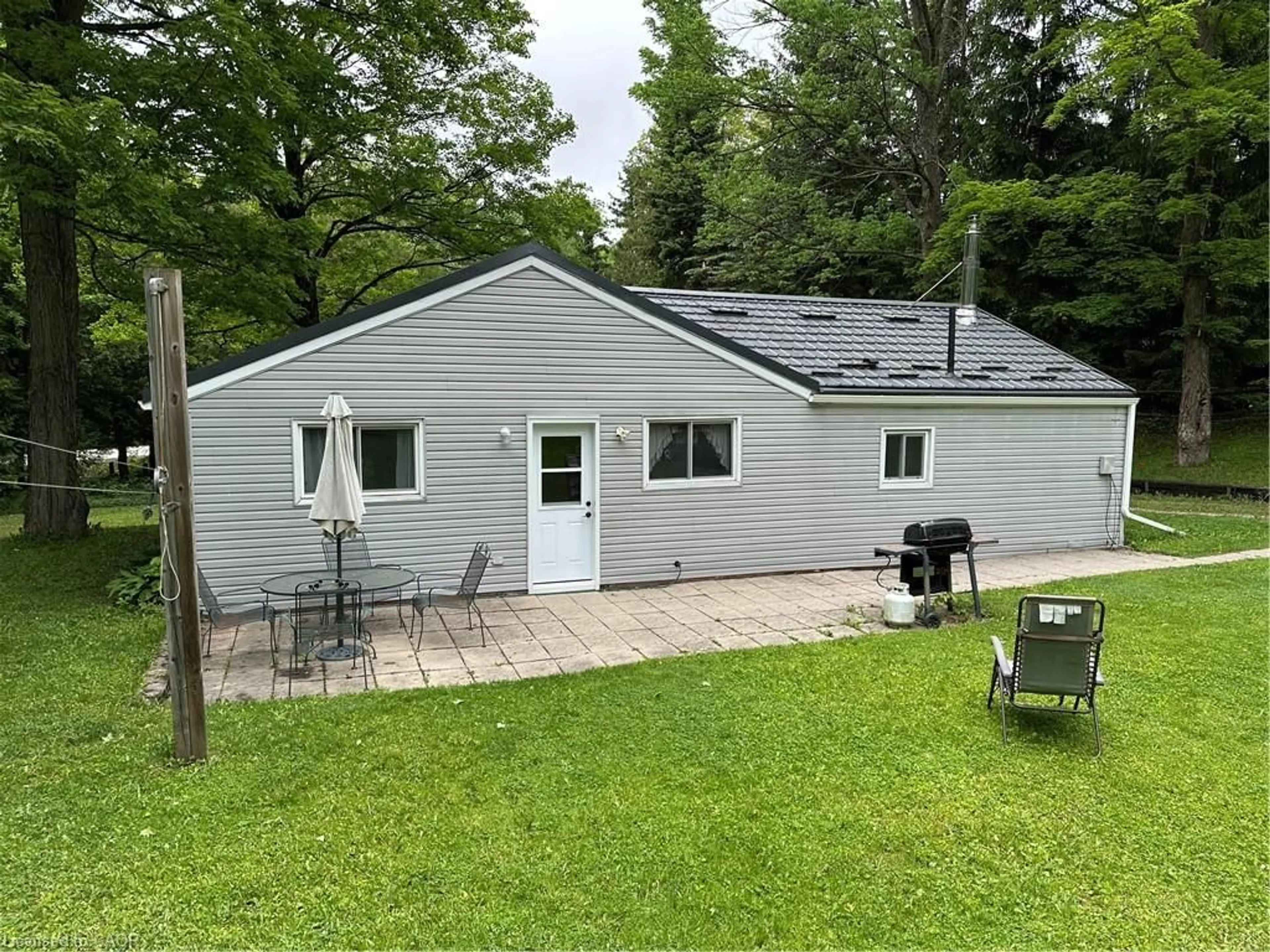 A pic from outside/outdoor area/front of a property/back of a property/a pic from drone, unknown for 263076 Wilder Lake Rd, Varney Ontario N0G 1R0