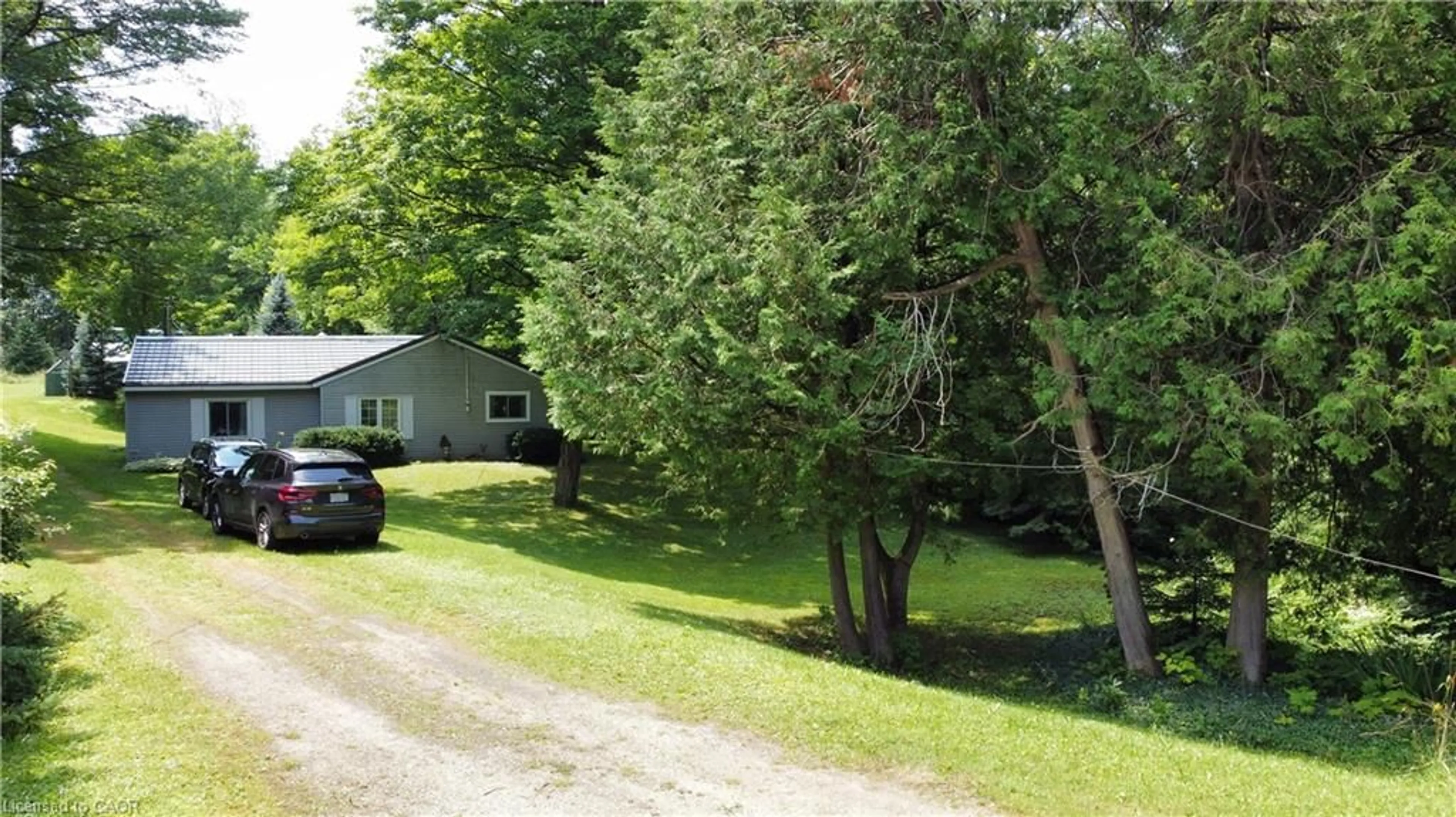 A pic from outside/outdoor area/front of a property/back of a property/a pic from drone, street for 263076 Wilder Lake Rd, Varney Ontario N0G 1R0