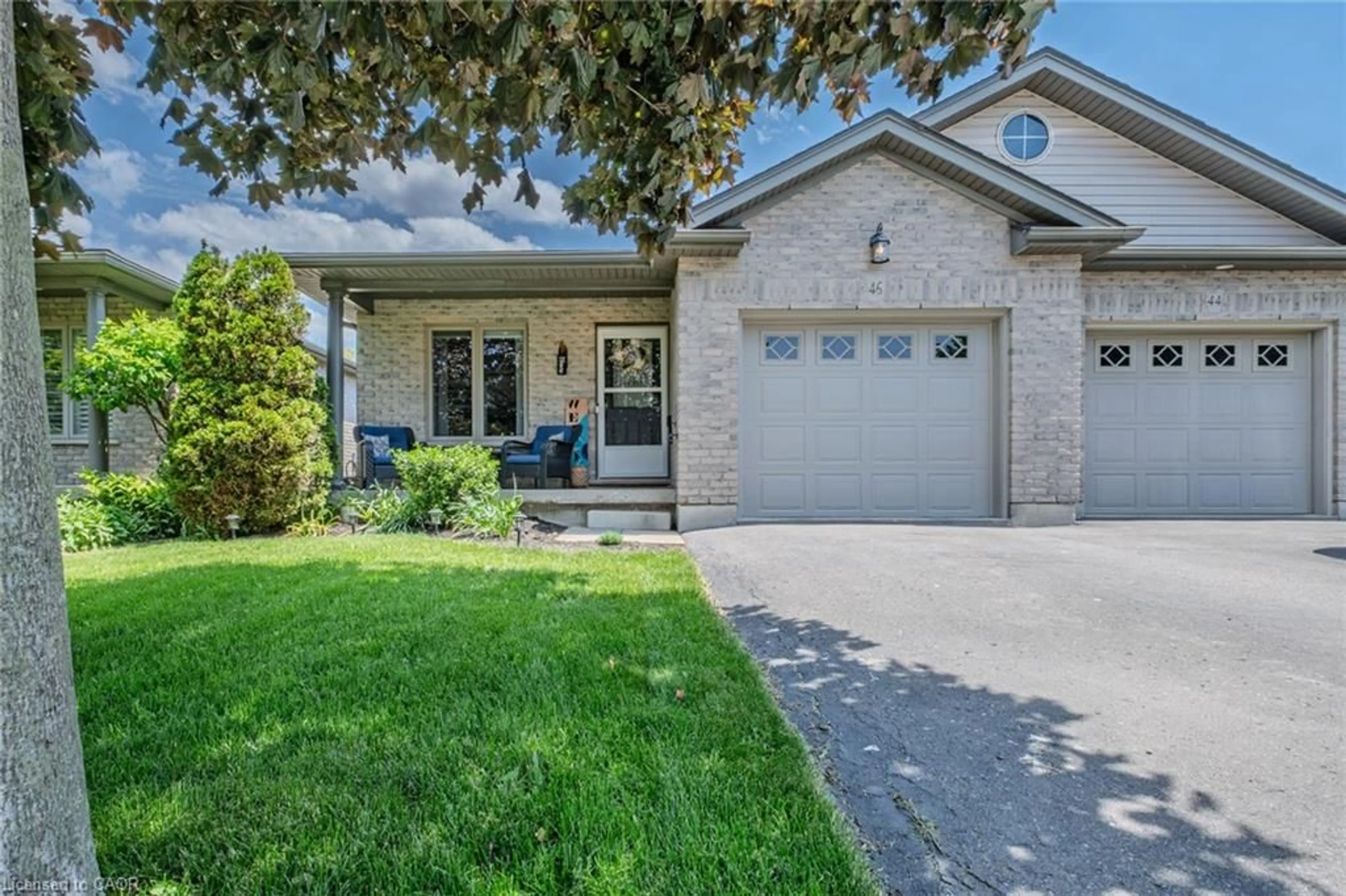 Home with brick exterior material, street for 46 Pheasant Trail, Port Dover Ontario N0A 1N5