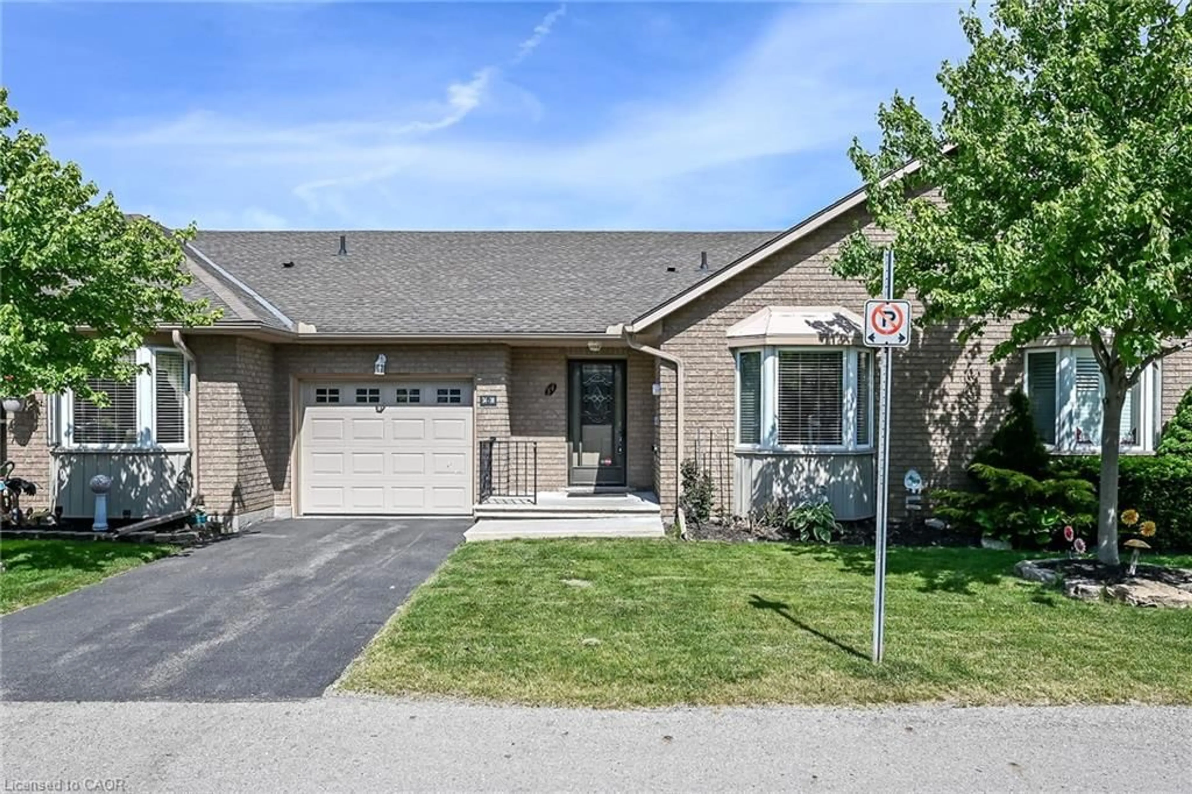 Home with brick exterior material, street for 30 Braemar Ave #34, Caledonia Ontario N3W 2M1
