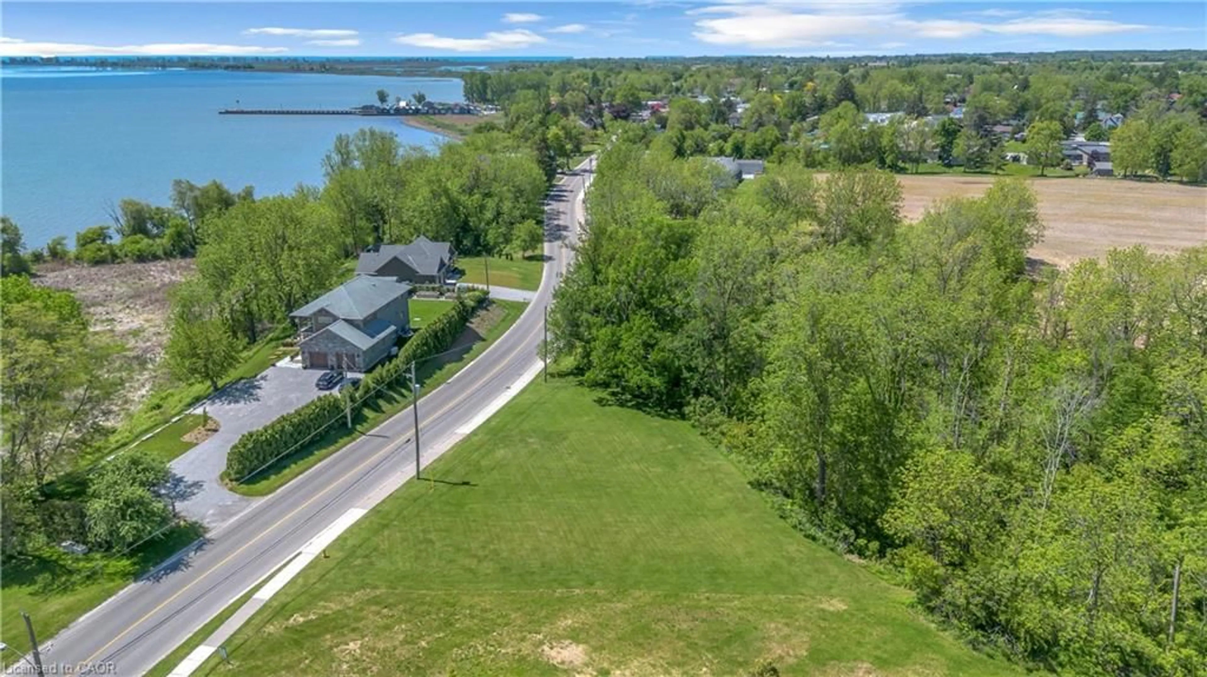 A pic from outside/outdoor area/front of a property/back of a property/a pic from drone, water/lake/river/ocean view for 71 Wolven St, Port Rowan Ontario N0E 1M0