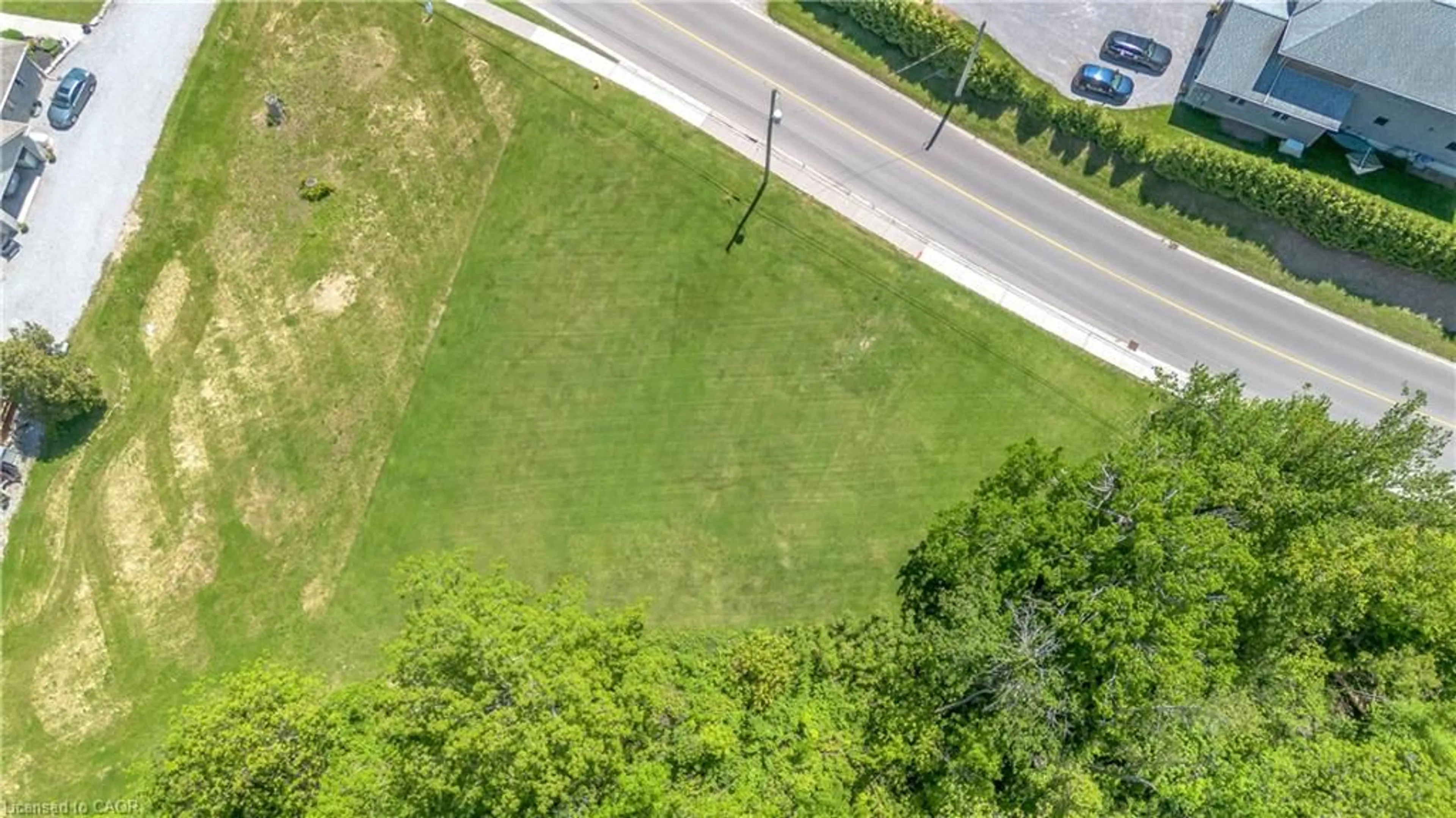 A pic from outside/outdoor area/front of a property/back of a property/a pic from drone, street for 71 Wolven St, Port Rowan Ontario N0E 1M0