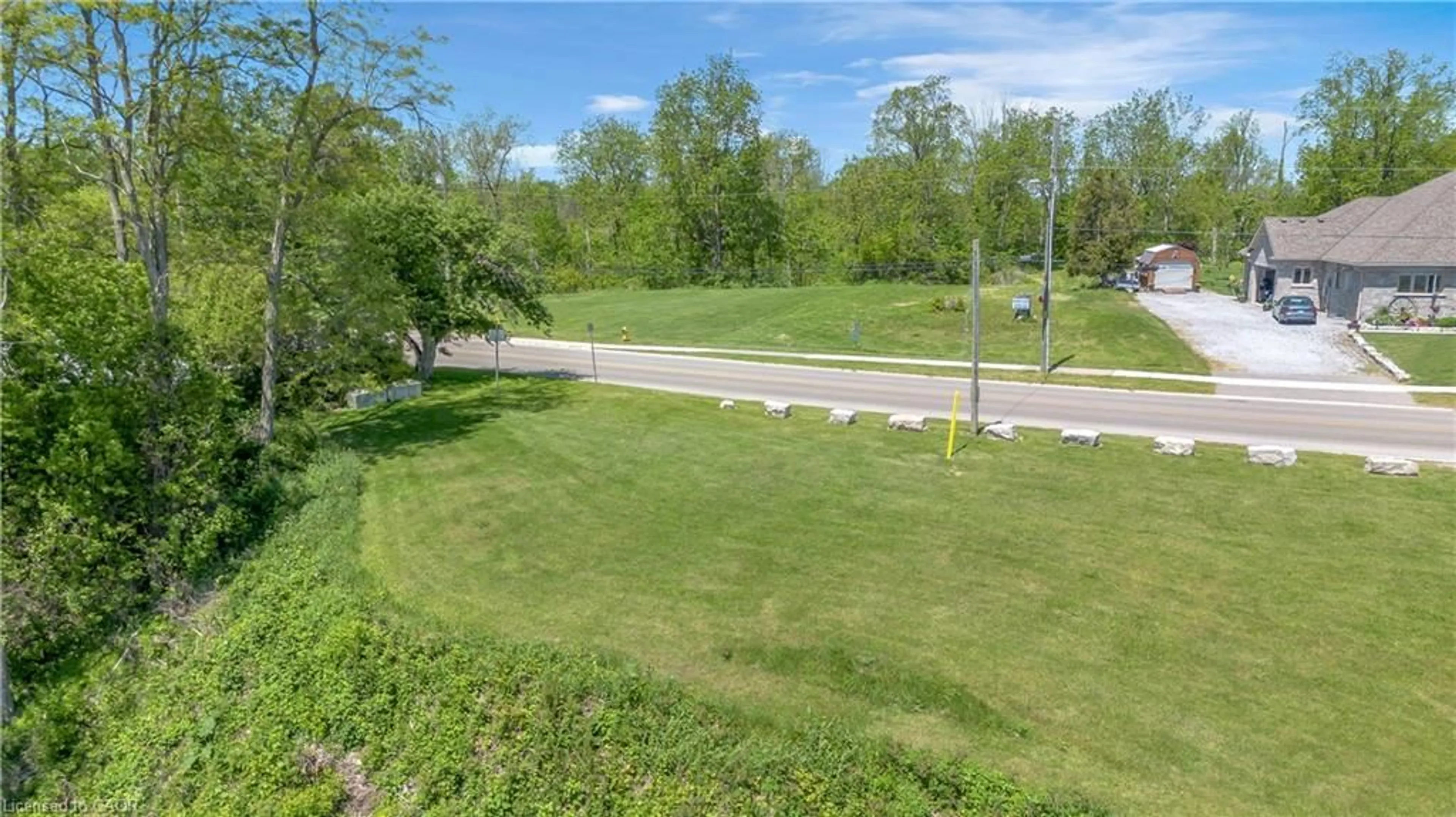 A pic from outside/outdoor area/front of a property/back of a property/a pic from drone, water/lake/river/ocean view for 71 Wolven St, Port Rowan Ontario N0E 1M0