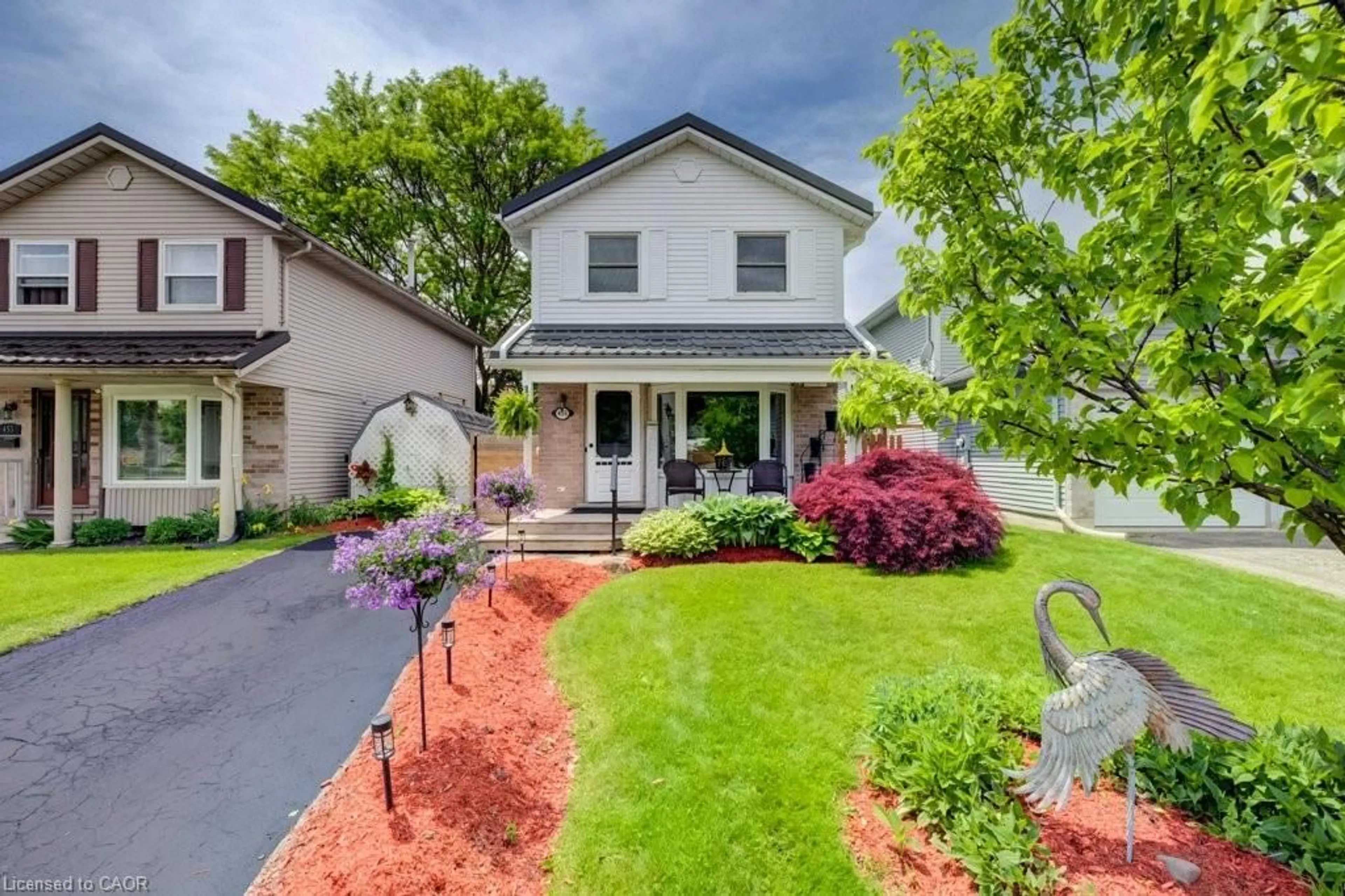 Home with vinyl exterior material, street for 455 Boettger Pl, Waterloo Ontario N2K 3N5