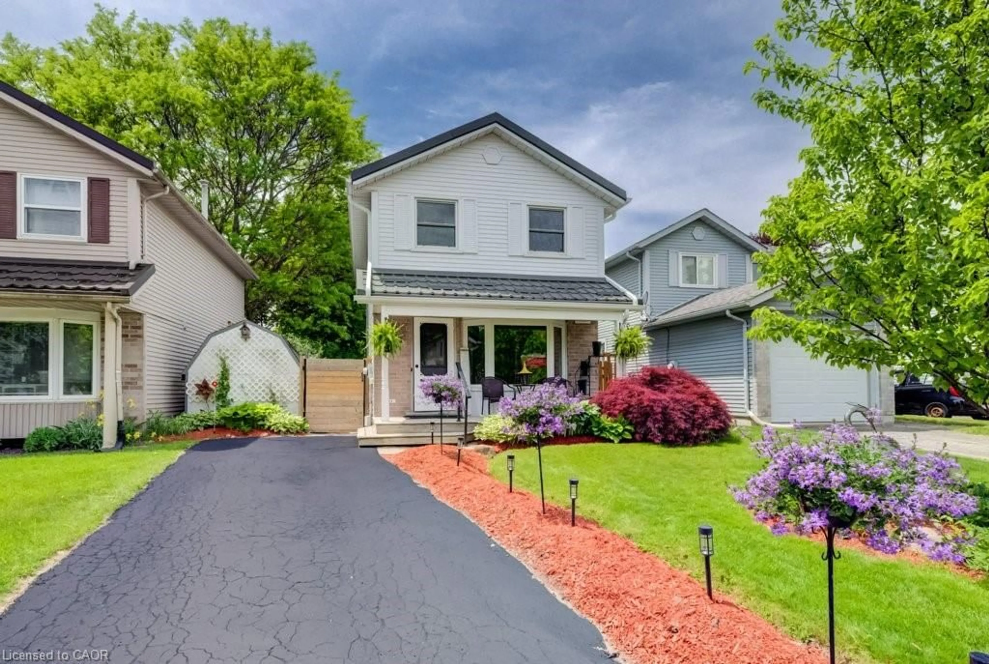 Home with vinyl exterior material, street for 455 Boettger Pl, Waterloo Ontario N2K 3N5