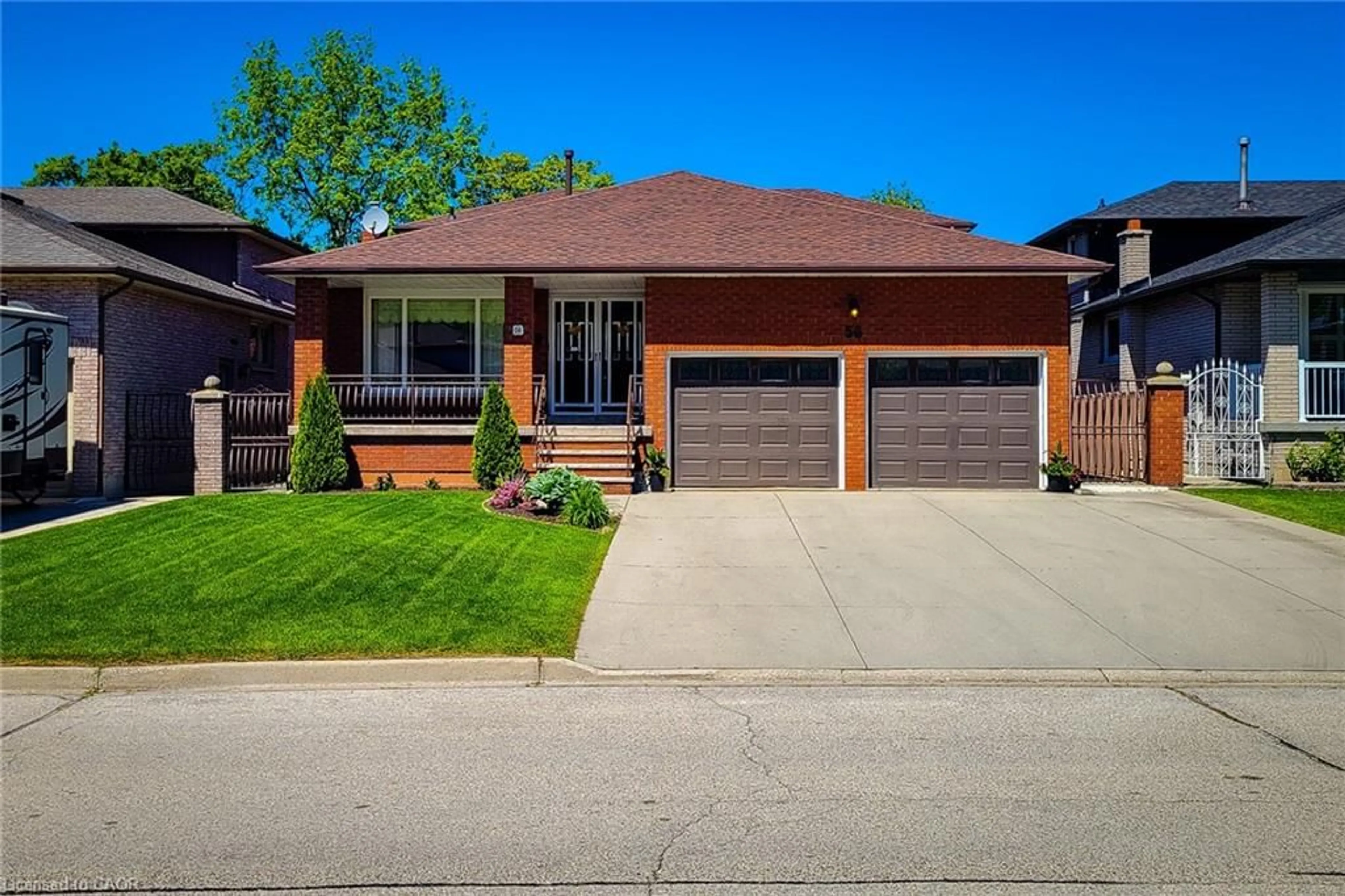 Home with brick exterior material, street for 56 Teak St, Stoney Creek Ontario L8G 4W5