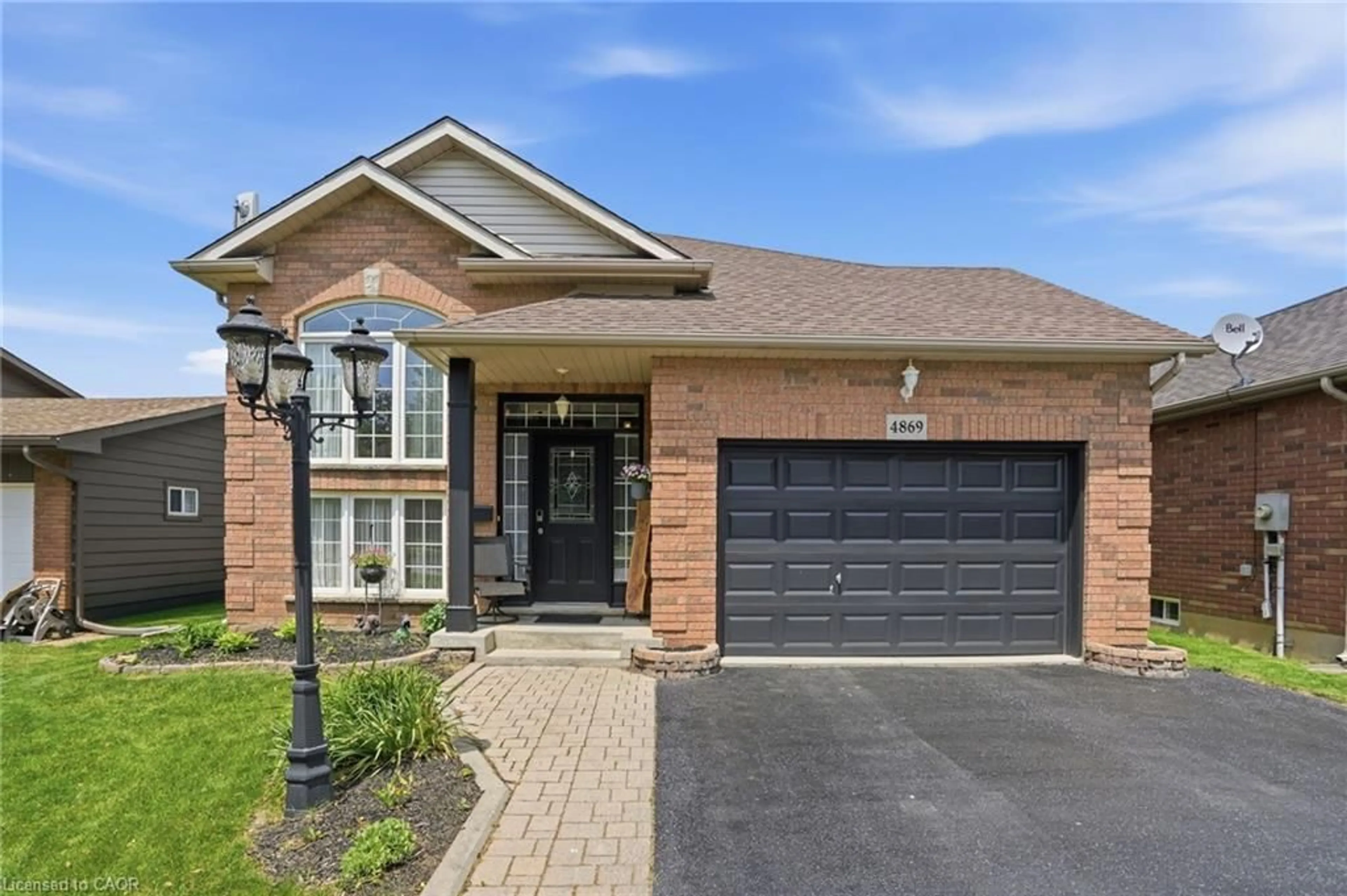 Home with brick exterior material, street for 4869 Cherrywood Dr, Beamsville Ontario L3J 0G3