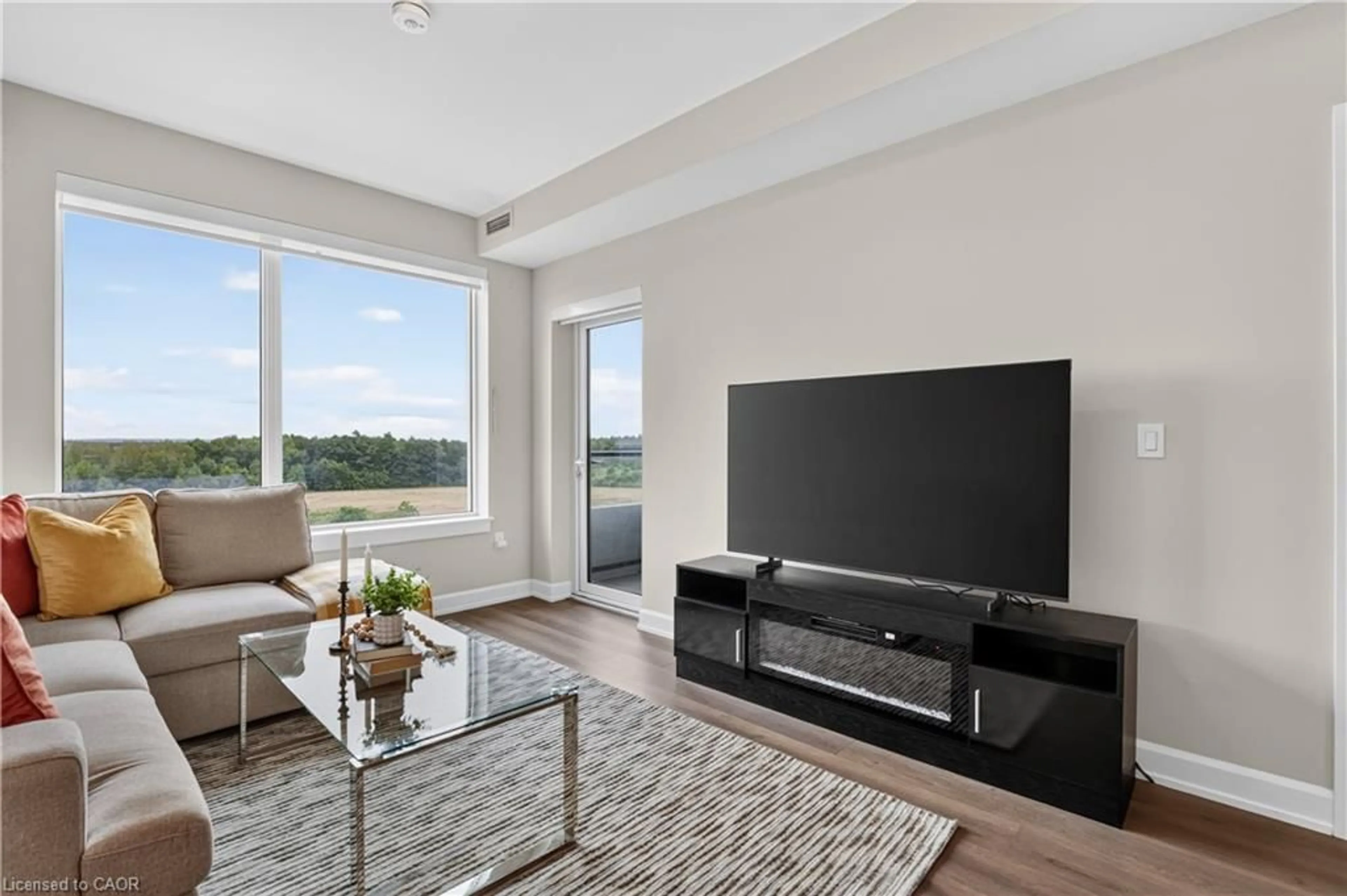 Living room with furniture, unknown for 3200 William Coltson Ave #622, Oakville Ontario L6H 7W6