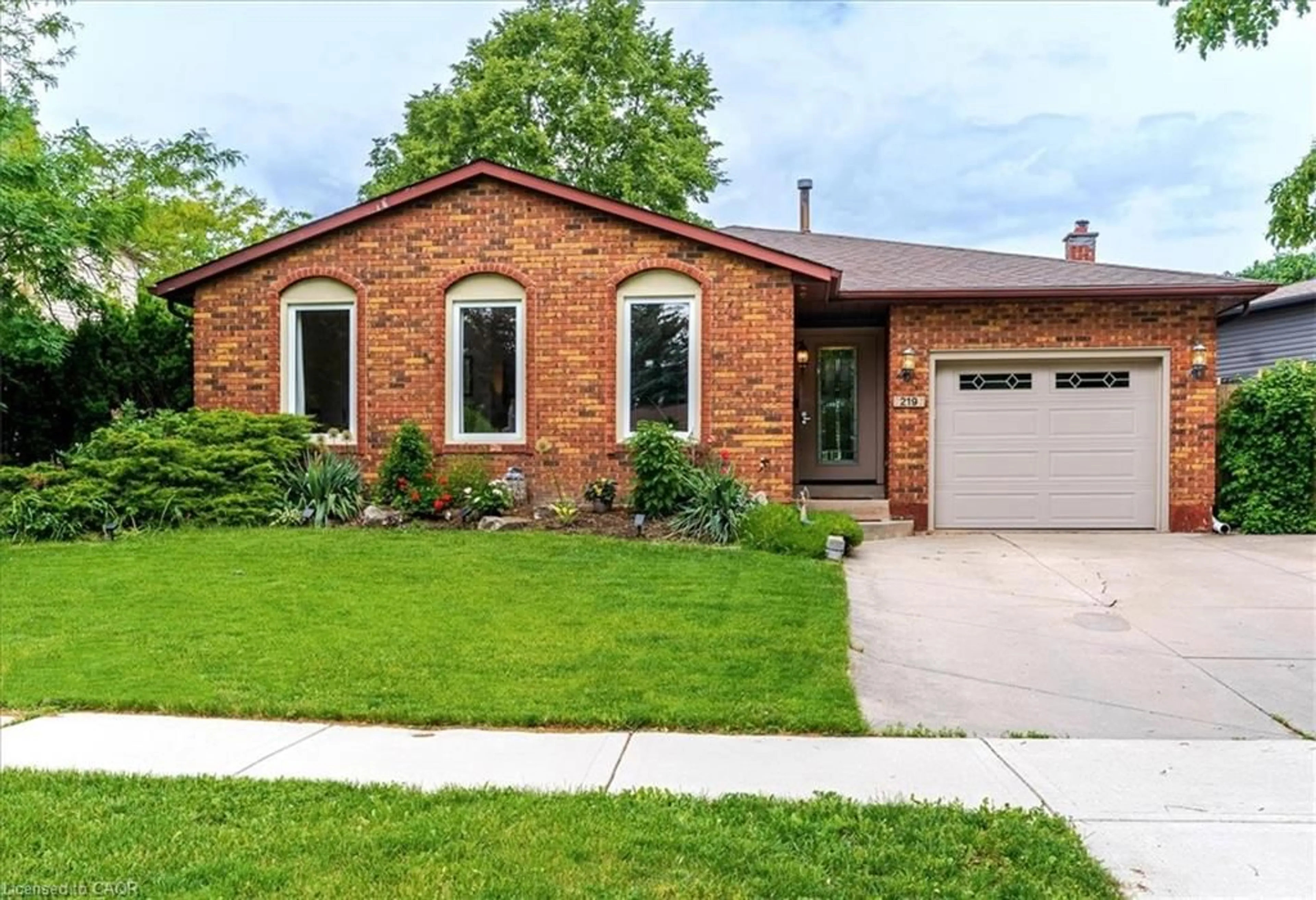 Home with brick exterior material, street for 219 Athenia Dr, Stoney Creek Ontario L8J 1T6