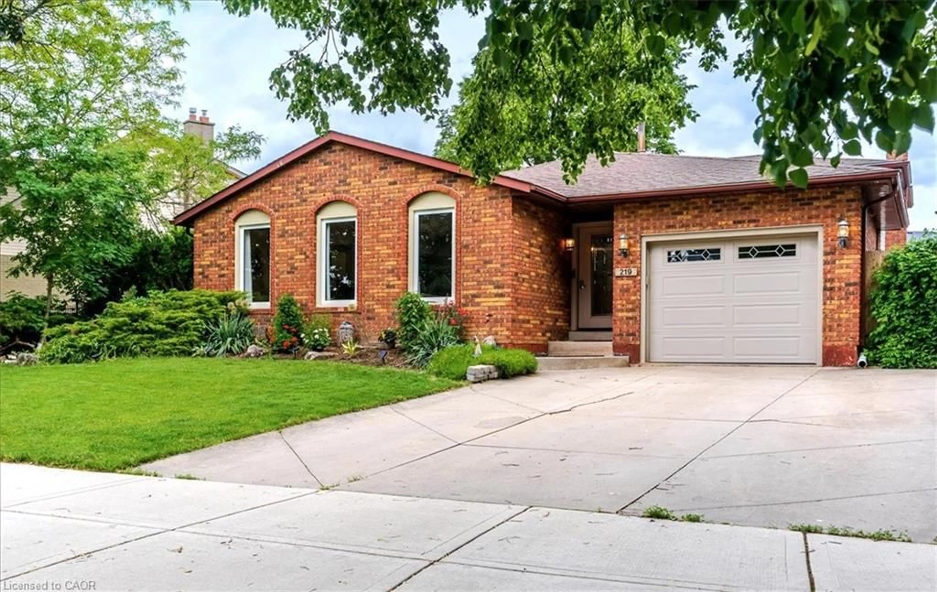 Home with brick exterior material, street for 219 Athenia Dr, Stoney Creek Ontario L8J 1T6