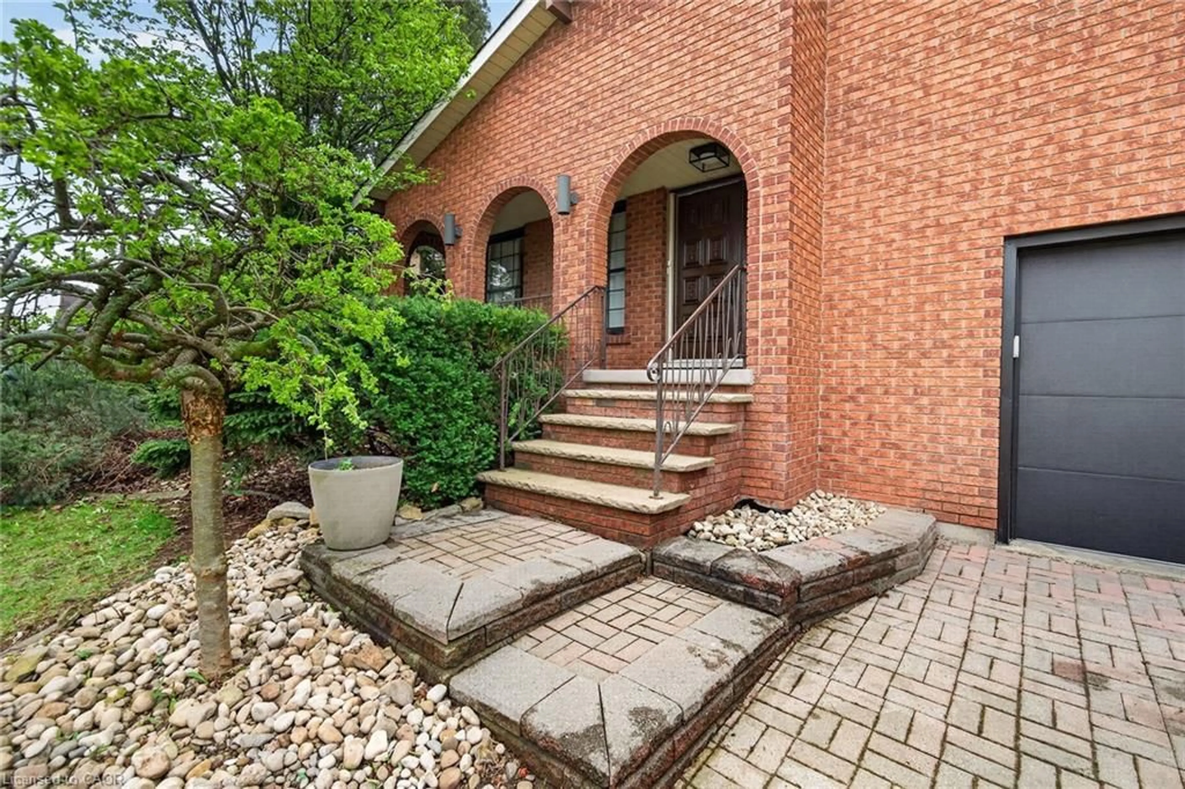 Home with brick exterior material, street for 51 President Dr, Stoney Creek Ontario L8G 4H2