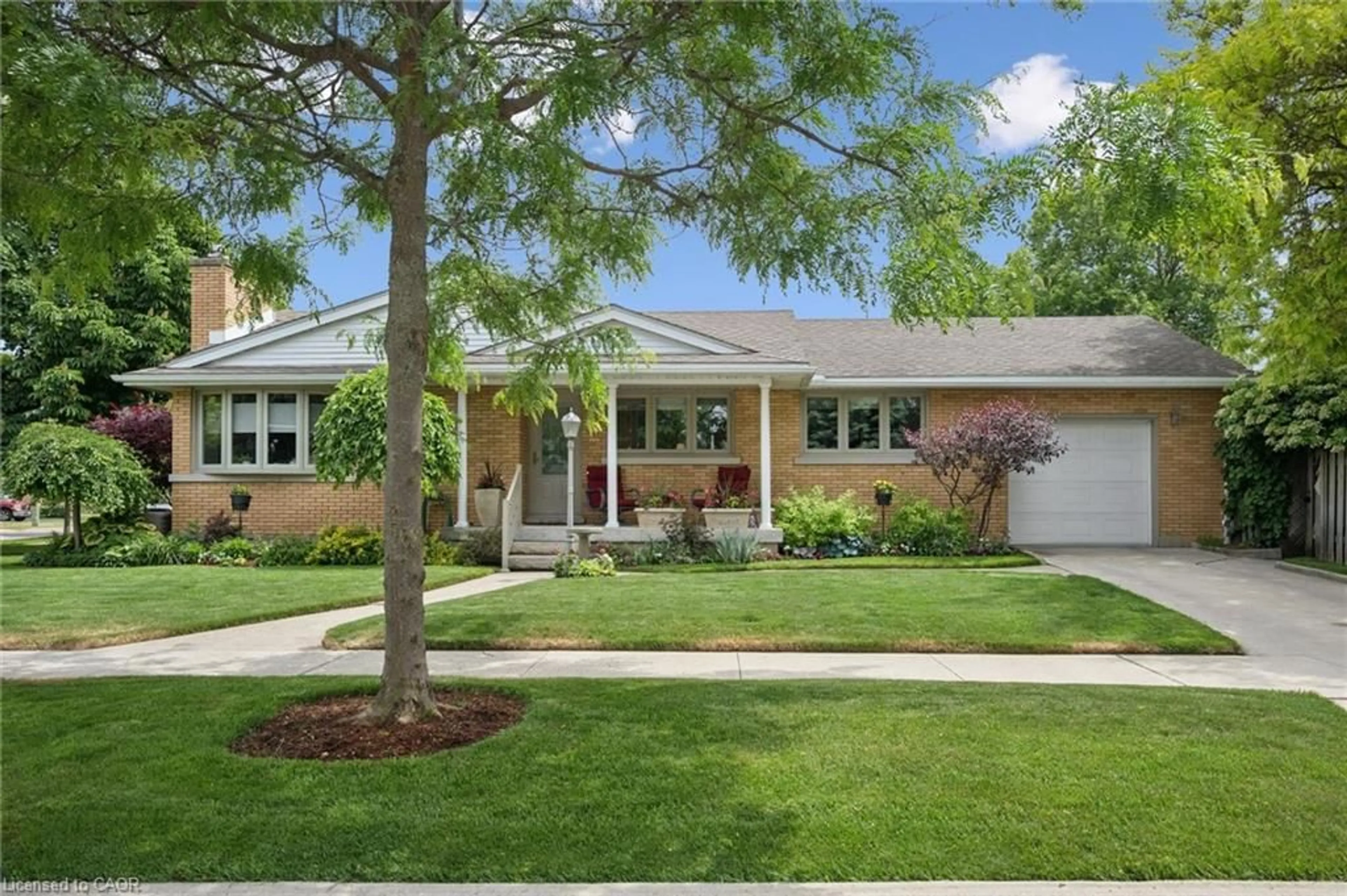 Home with brick exterior material, street for 317 Pandora Ave, Kitchener Ontario N2H 3E4