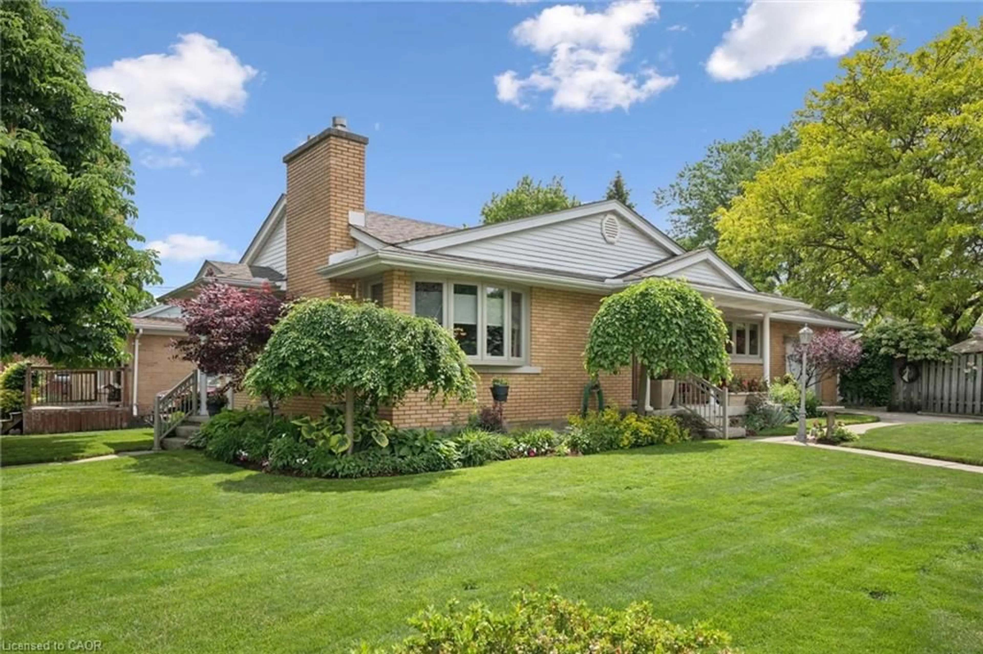 Home with brick exterior material, street for 317 Pandora Ave, Kitchener Ontario N2H 3E4