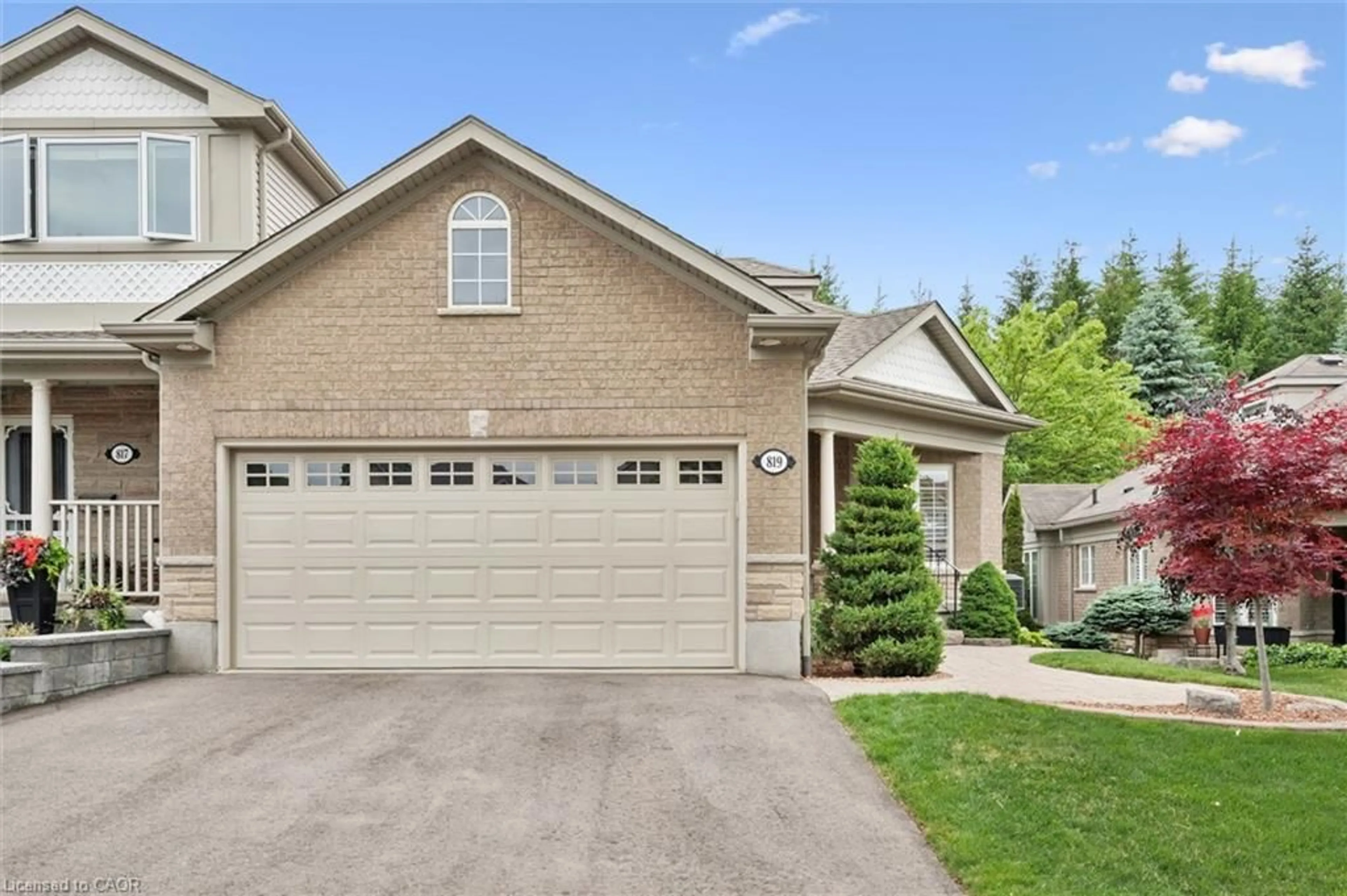 Home with brick exterior material, street for 819 Creekside Dr, Waterloo Ontario N2V 2S6