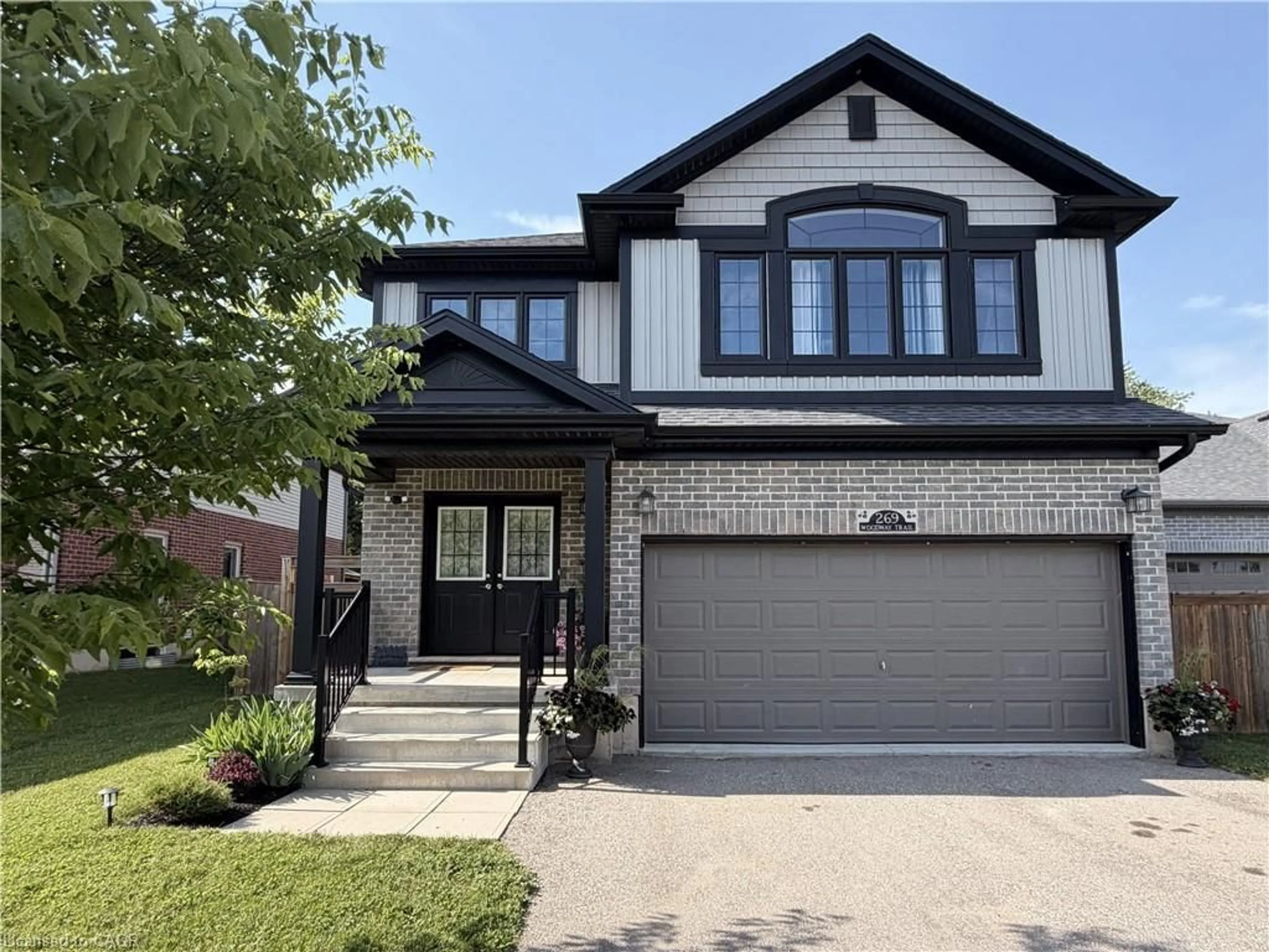 Home with brick exterior material, street for 269 Woodway Trail, Simcoe Ontario N3Y 0C9