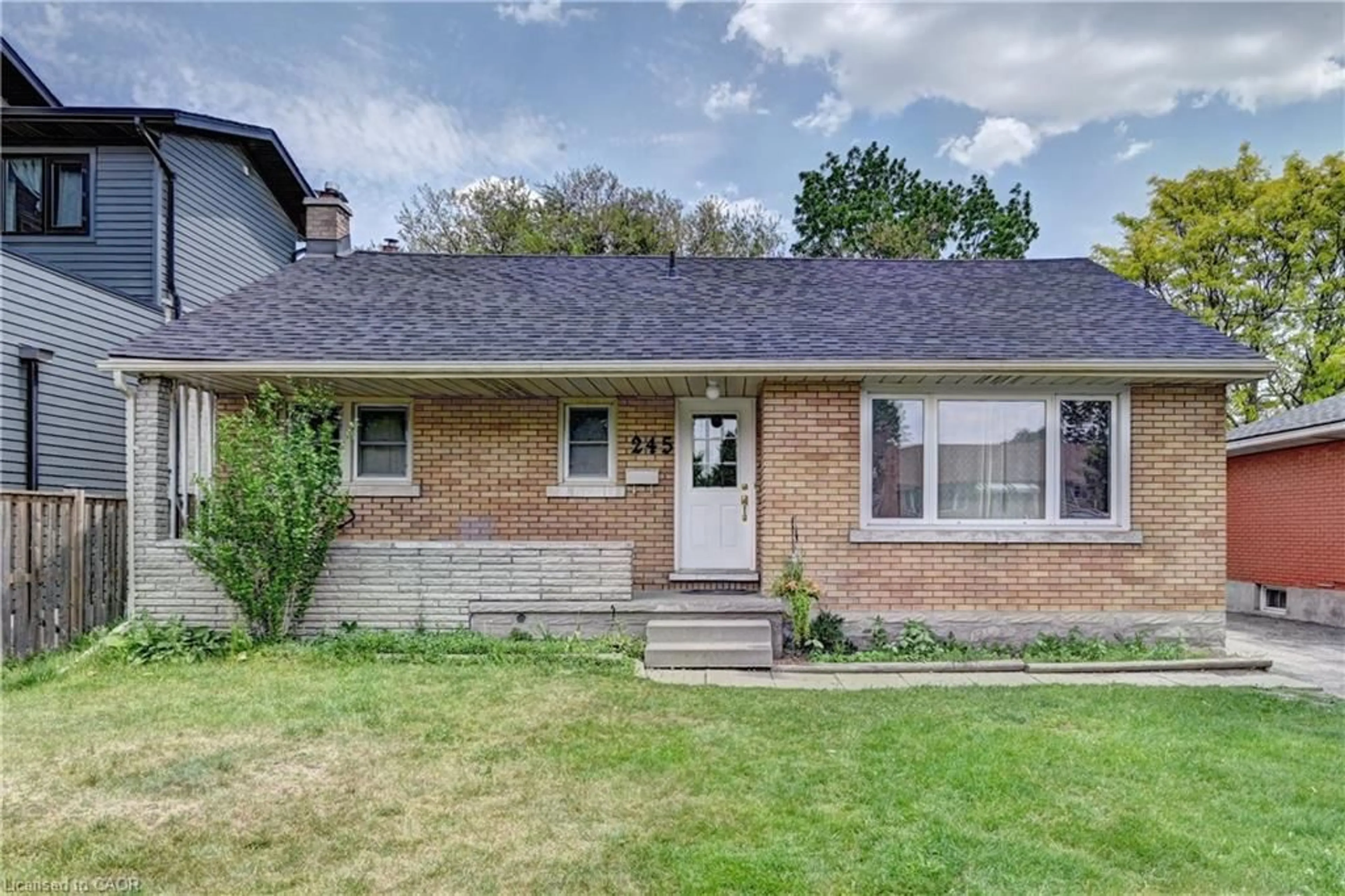 Home with brick exterior material, street for 245 Eighth Ave, Kitchener Ontario N2C 1S6