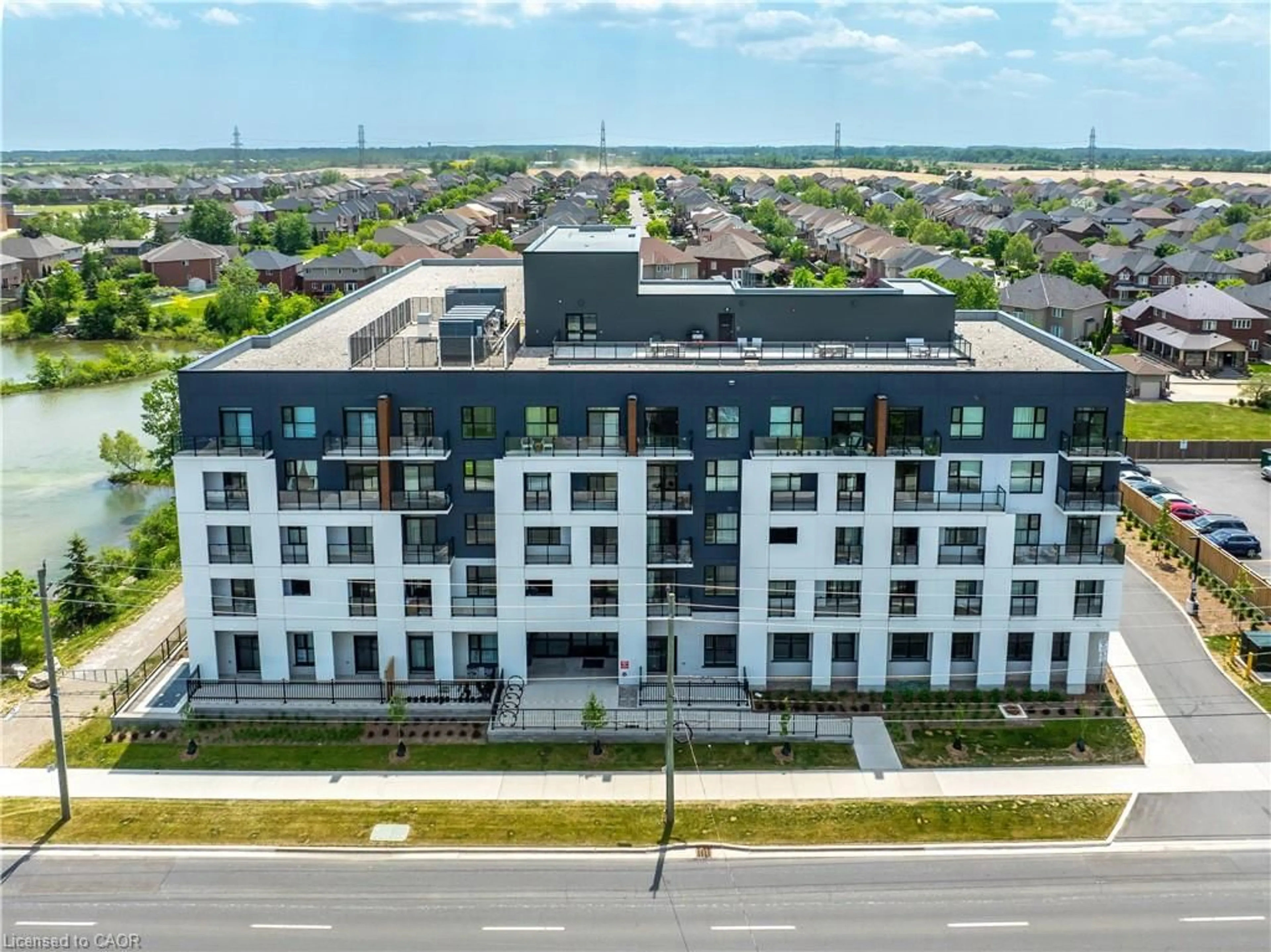 A pic from outside/outdoor area/front of a property/back of a property/a pic from drone, city buildings view from balcony for 1936 Rymal Rd #310, Hamilton Ontario L0R 1P0