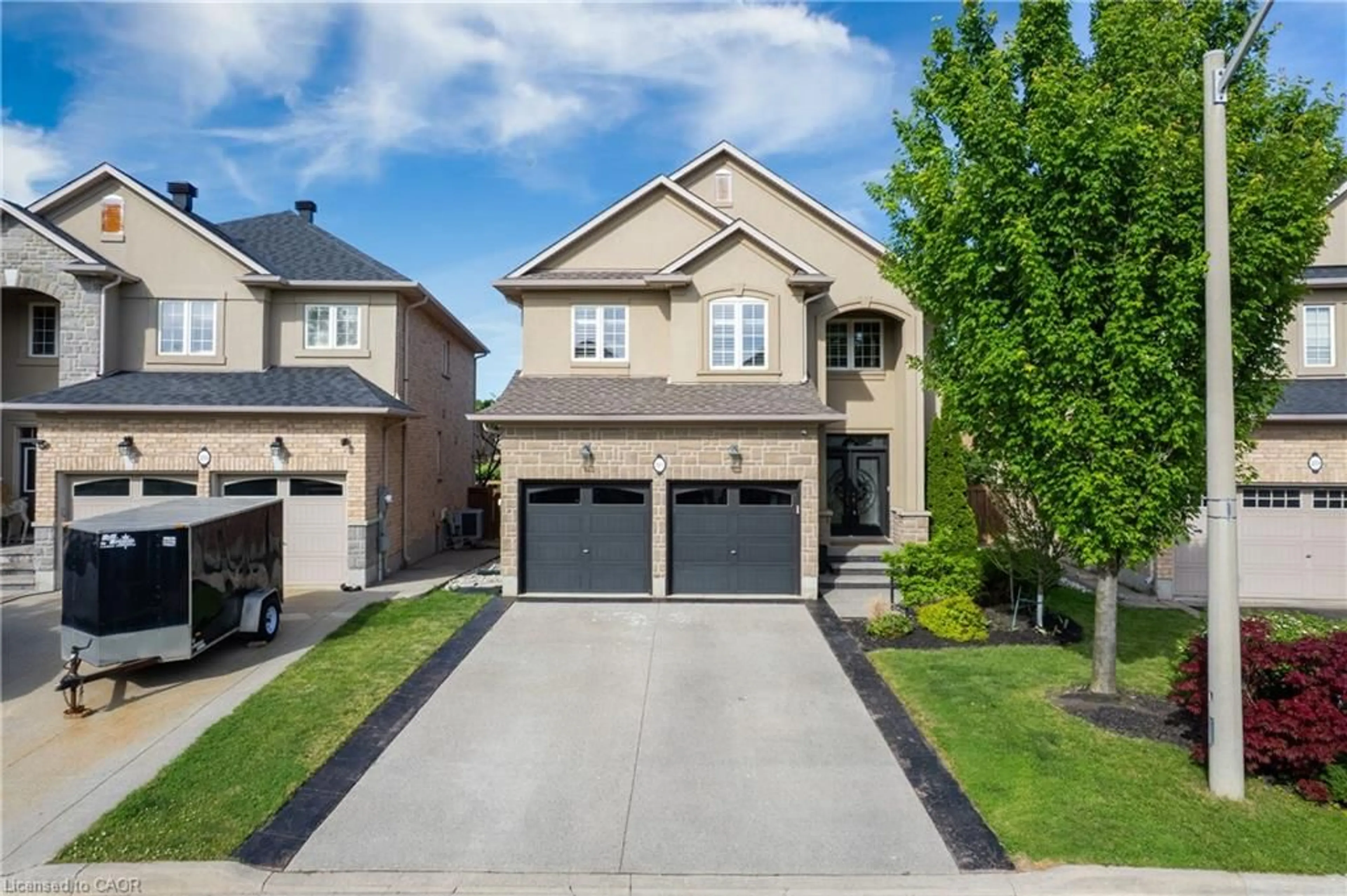 Home with brick exterior material, street for 215 Vinton Rd, Ancaster Ontario L9K 0G8