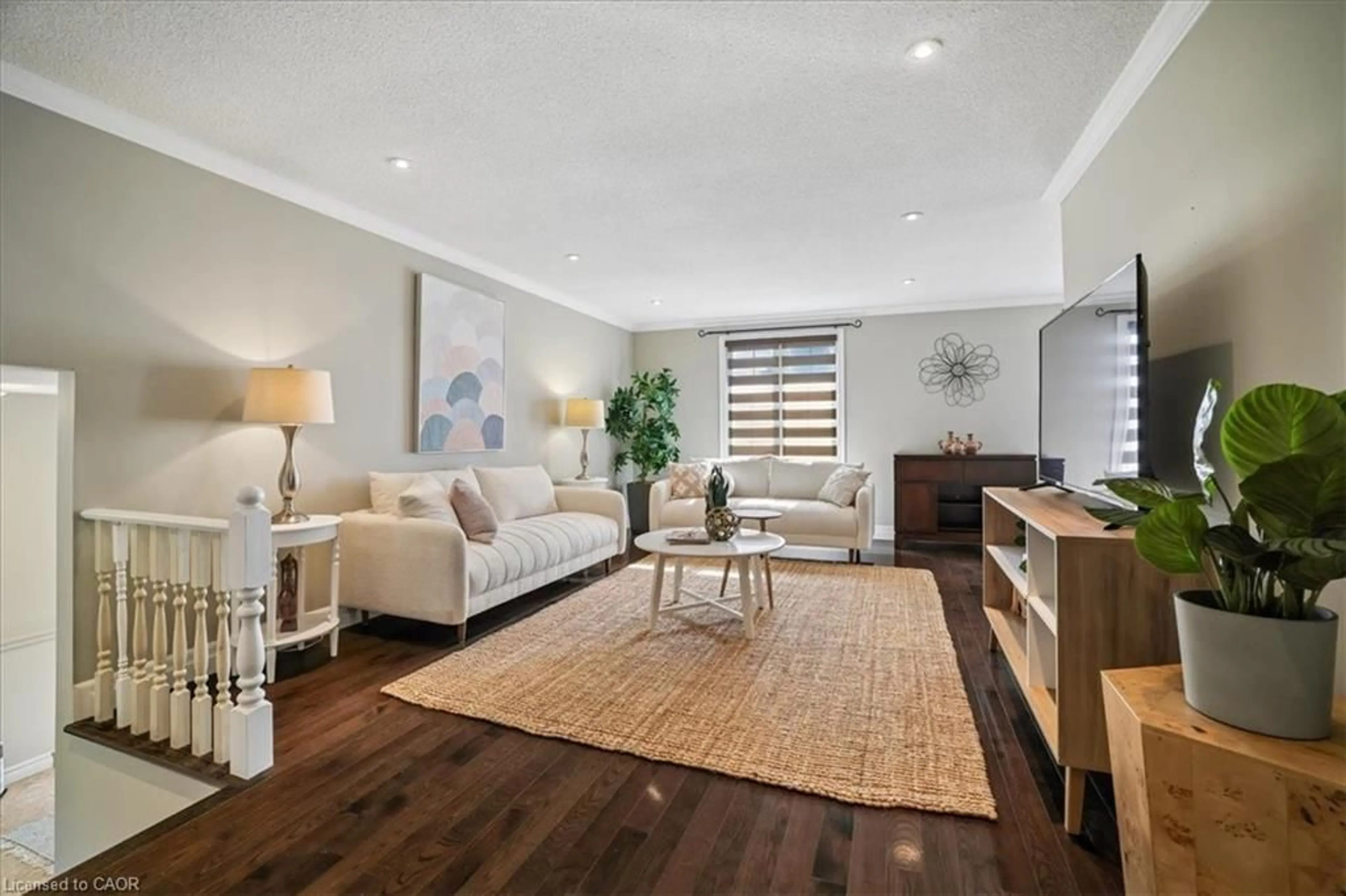 Living room with furniture, wood/laminate floor for 1 Amesbury Cres, Stoney Creek Ontario L8J 1Z9