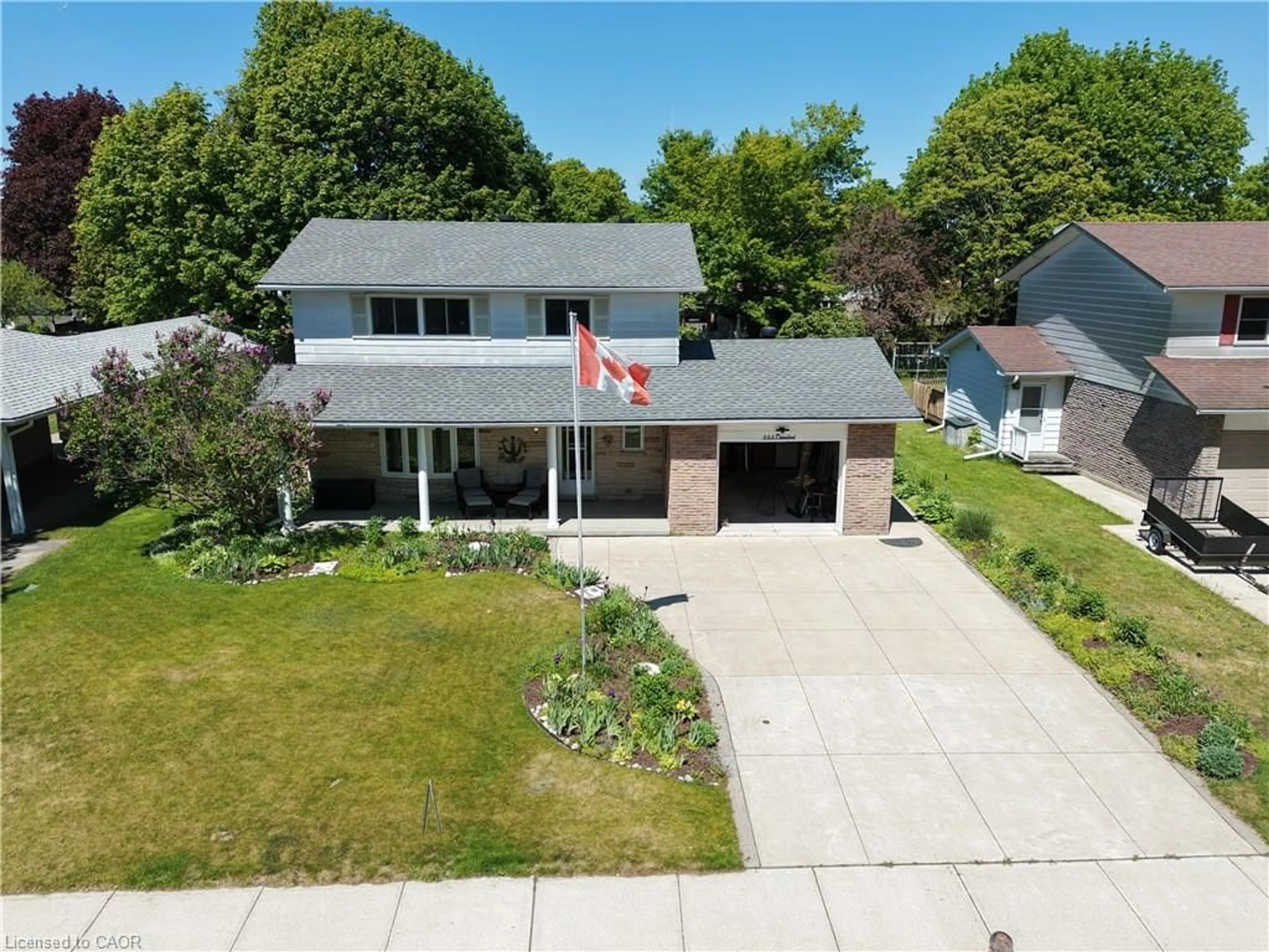 A pic from outside/outdoor area/front of a property/back of a property/a pic from drone, street for 353 Crawford St, Port Elgin Ontario N0H 2C2