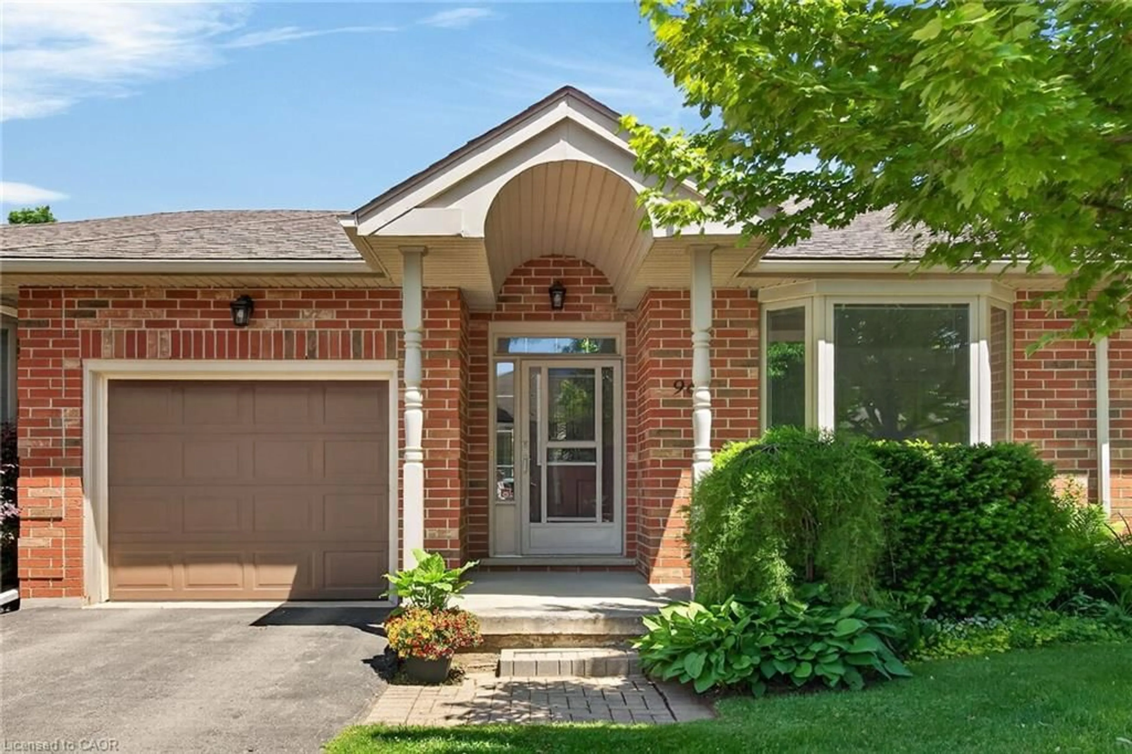 Home with brick exterior material, street for 96 Bluelagoon Dr, Mount Hope Ontario L0R 1W0