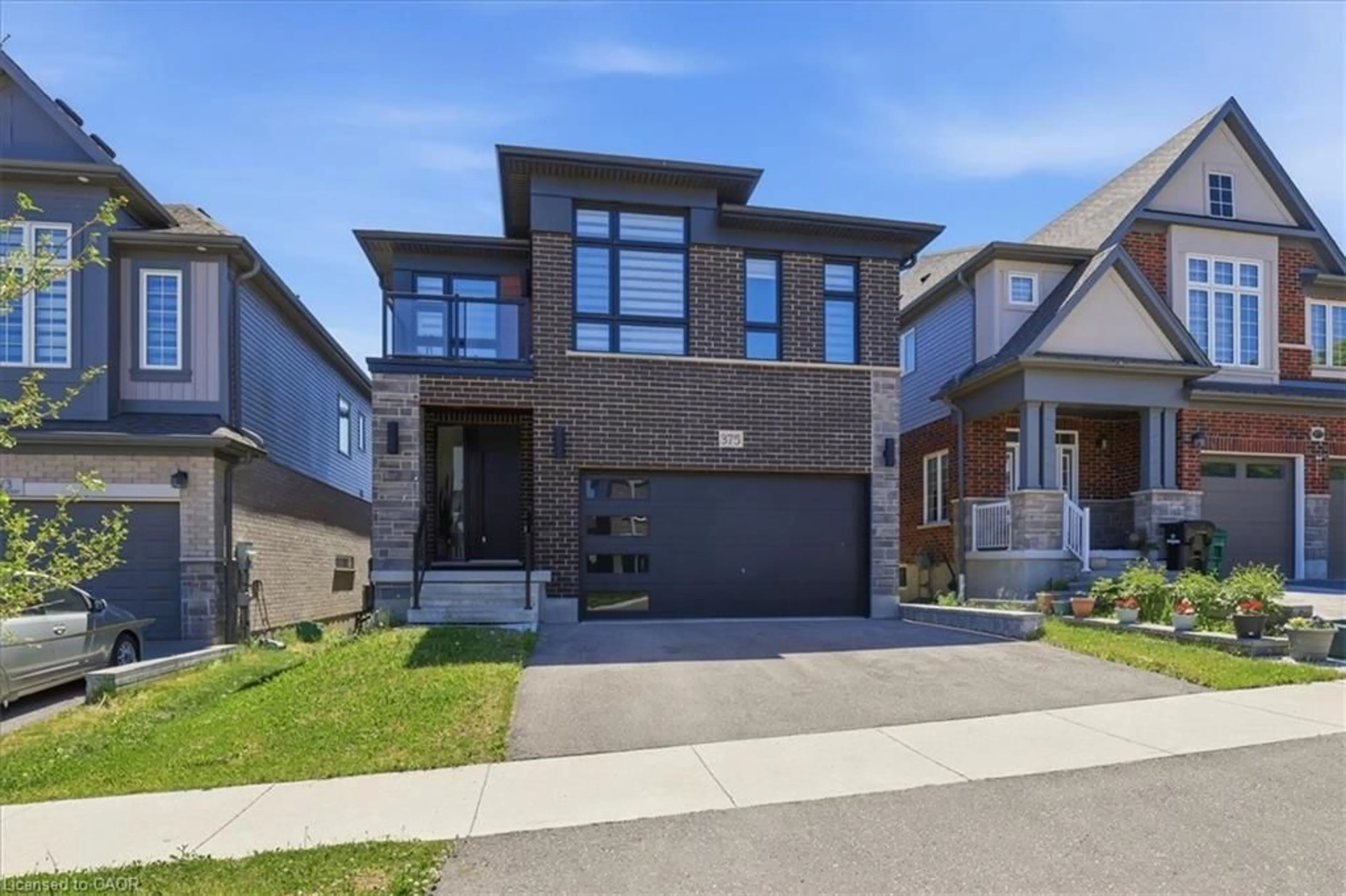 Home with brick exterior material, street for 375 Chokecherry Cres, Waterloo Ontario N2V 0H1