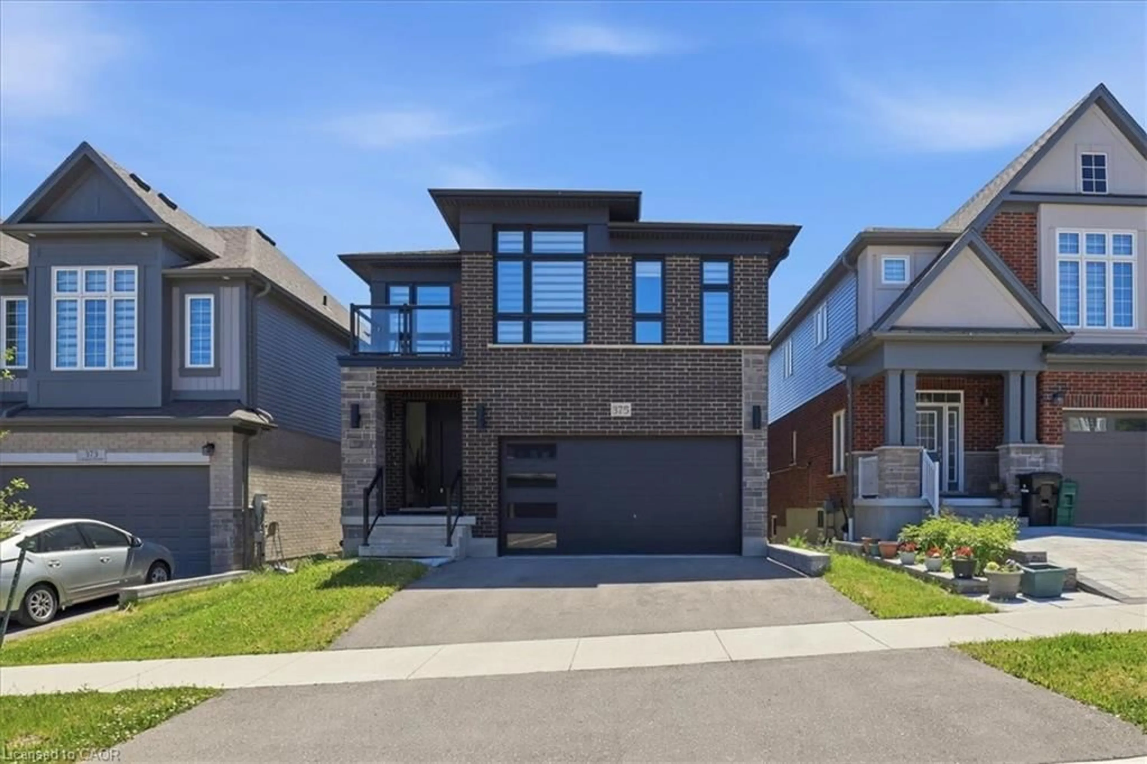 Home with brick exterior material, street for 375 Chokecherry Cres, Waterloo Ontario N2V 0H1