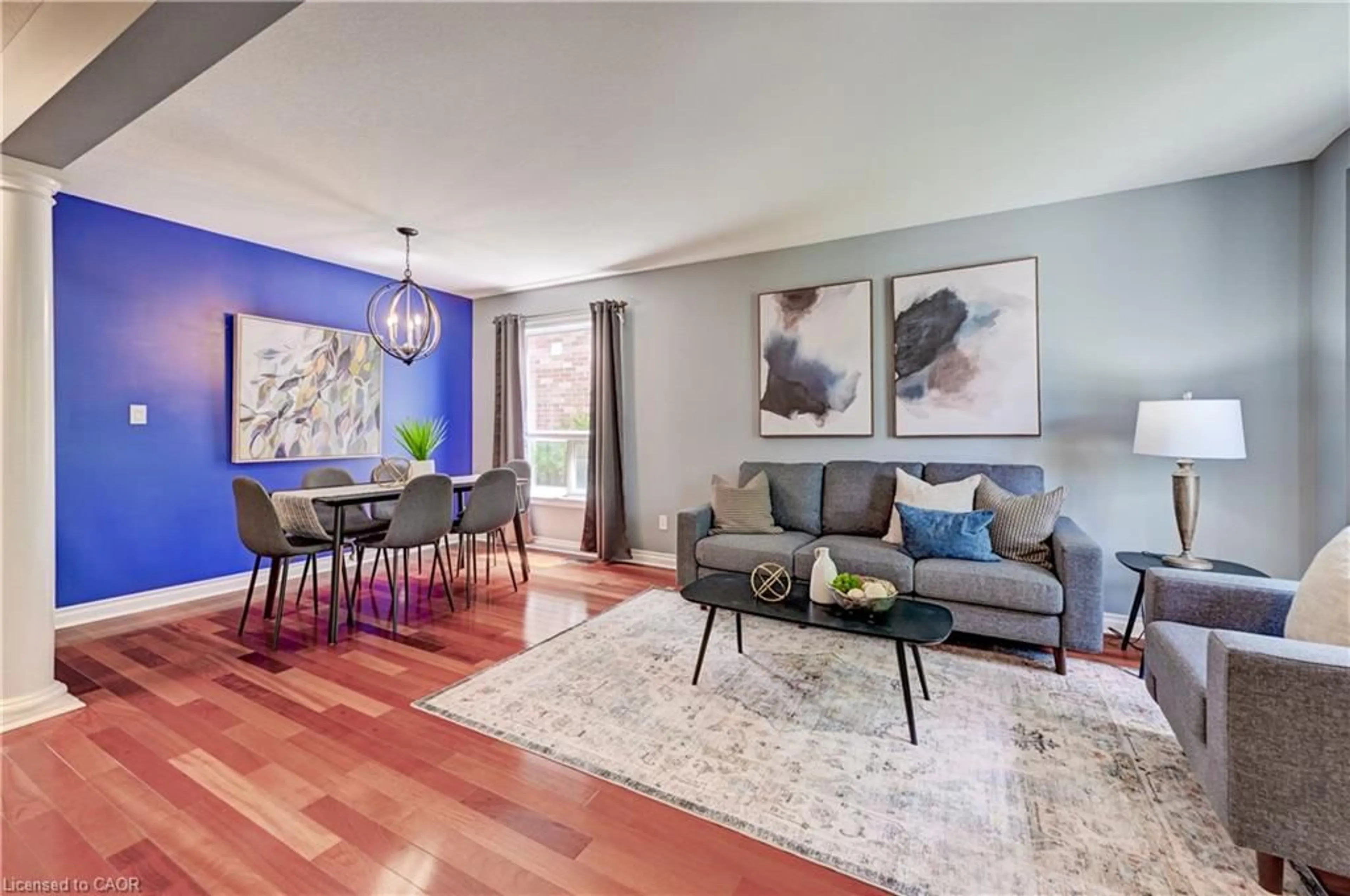 Living room with furniture, wood/laminate floor for 454 Hearthwood Dr, Kitchener Ontario N2R 1K6
