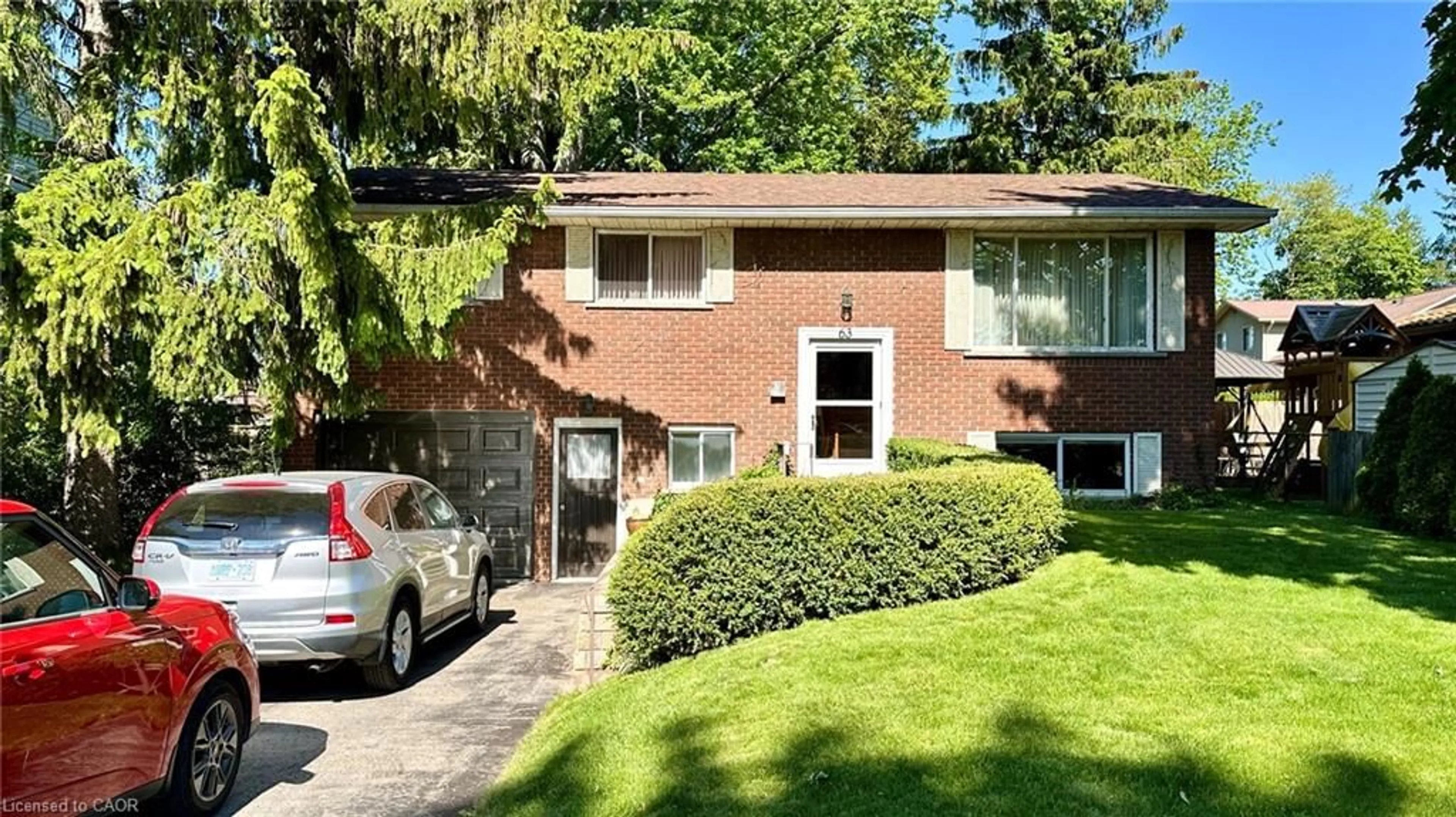 Home with brick exterior material, street for 63 Lee Ave, Simcoe Ontario N3Y 5B7