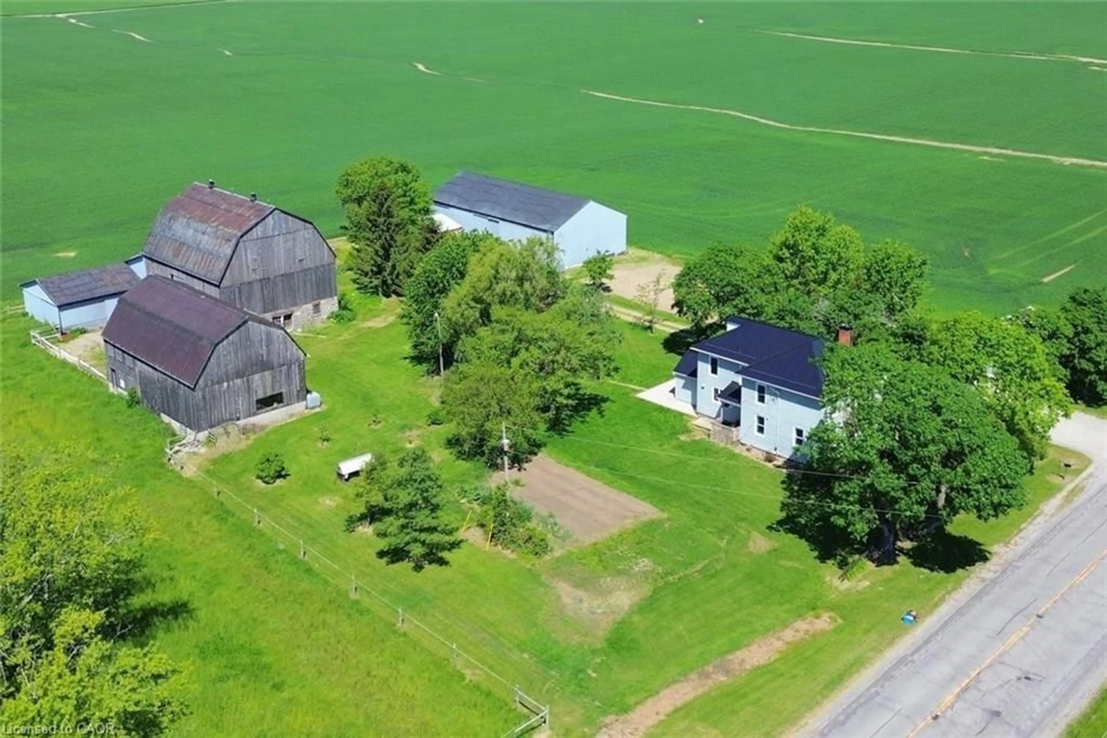 A pic from outside/outdoor area/front of a property/back of a property/a pic from drone, unknown for 335 Haldimand Rd 12, Fisherville Ontario N0A 1G0