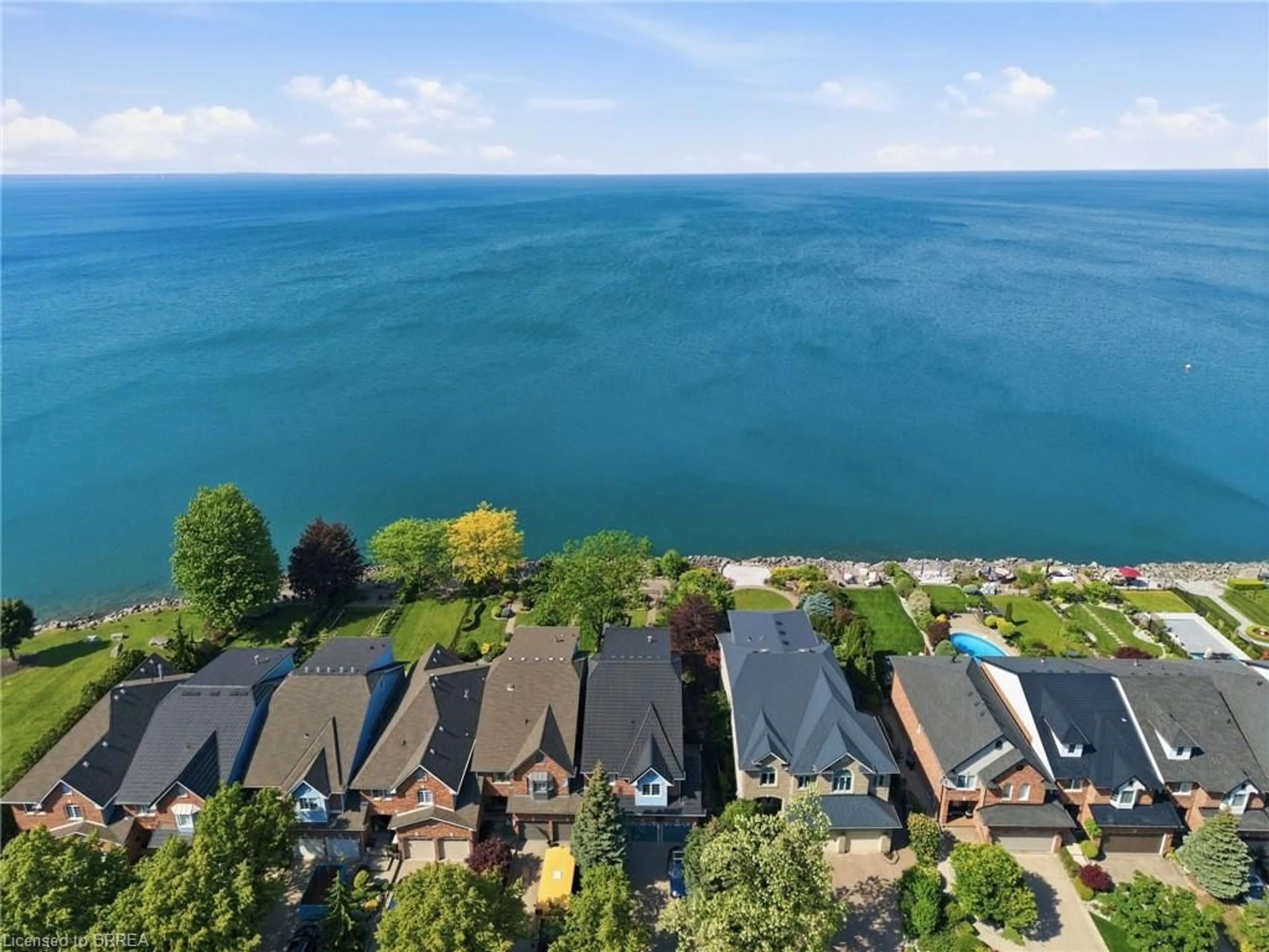 A pic from outside/outdoor area/front of a property/back of a property/a pic from drone, water/lake/river/ocean view for 23 Edgewater Dr, Stoney Creek Ontario L8E 4Z2