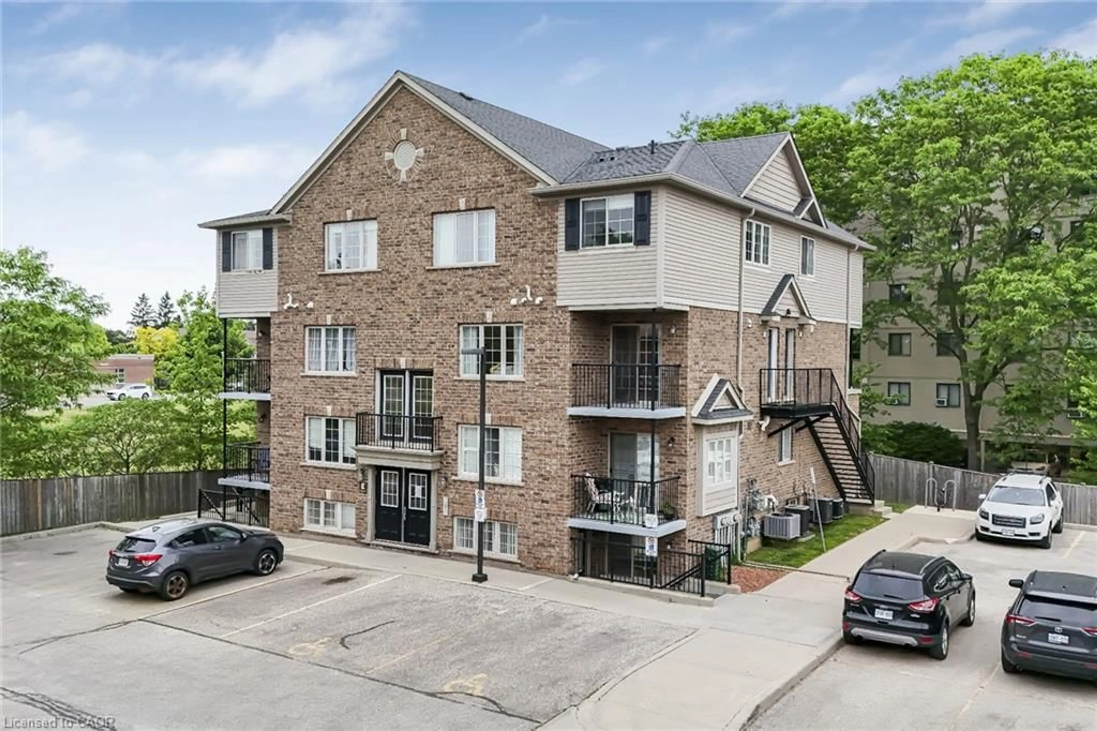 A pic from outside/outdoor area/front of a property/back of a property/a pic from drone, building for 12 Holborn Dr #37E, Kitchener Ontario N2A 0A4