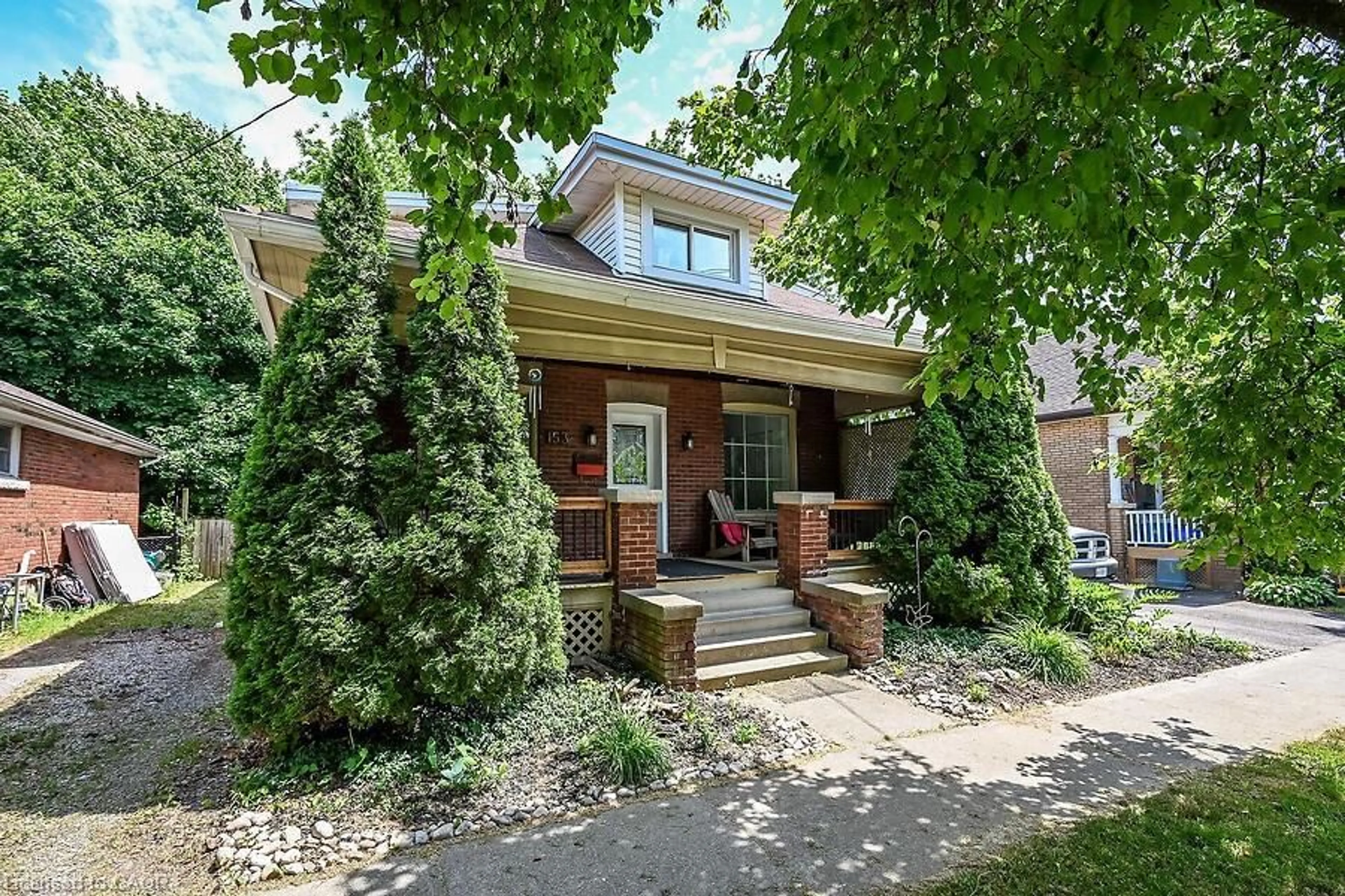 Home with brick exterior material, street for 153 Eagle Ave, Brantford Ontario N3S 1Z7
