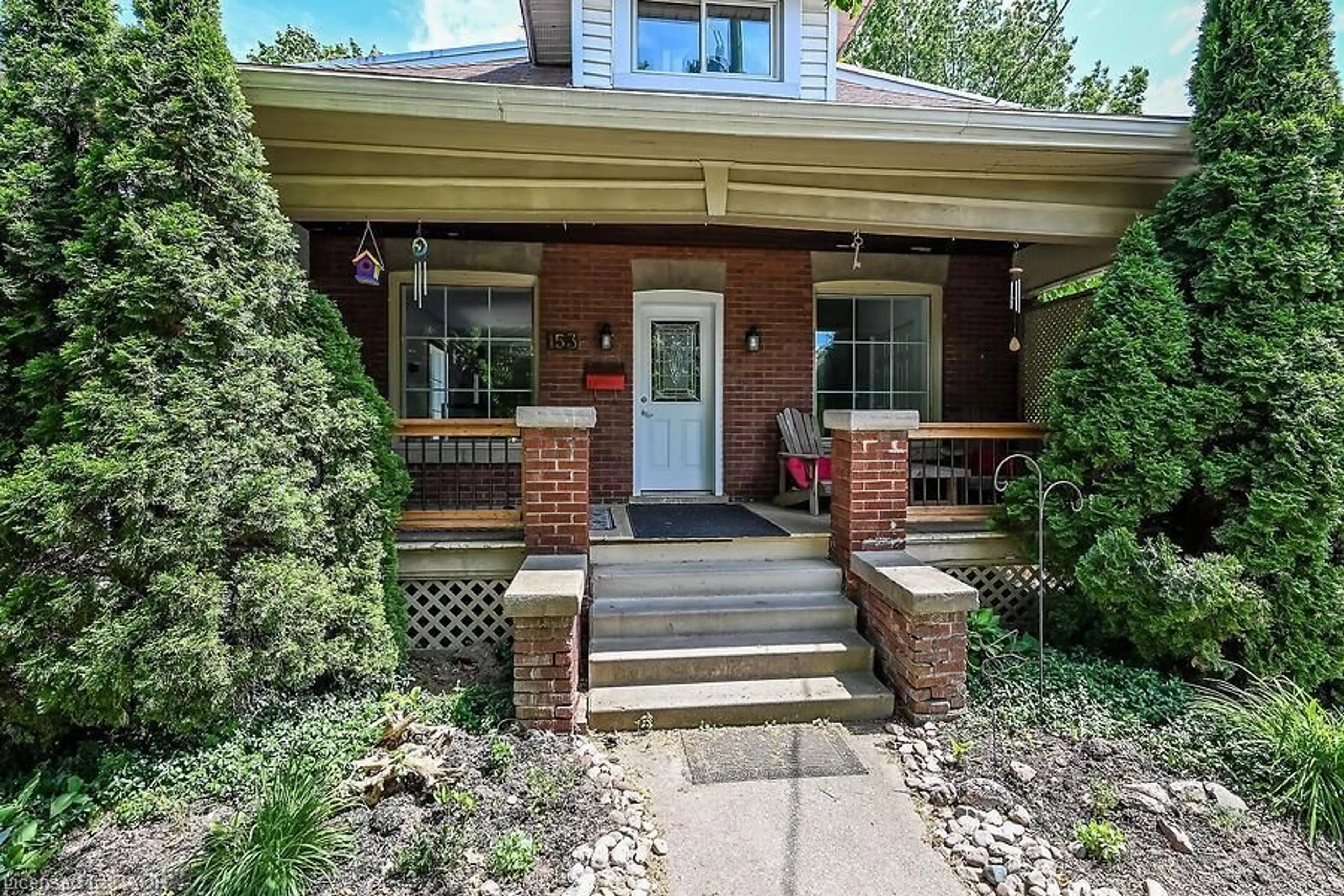 Home with brick exterior material, street for 153 Eagle Ave, Brantford Ontario N3S 1Z7