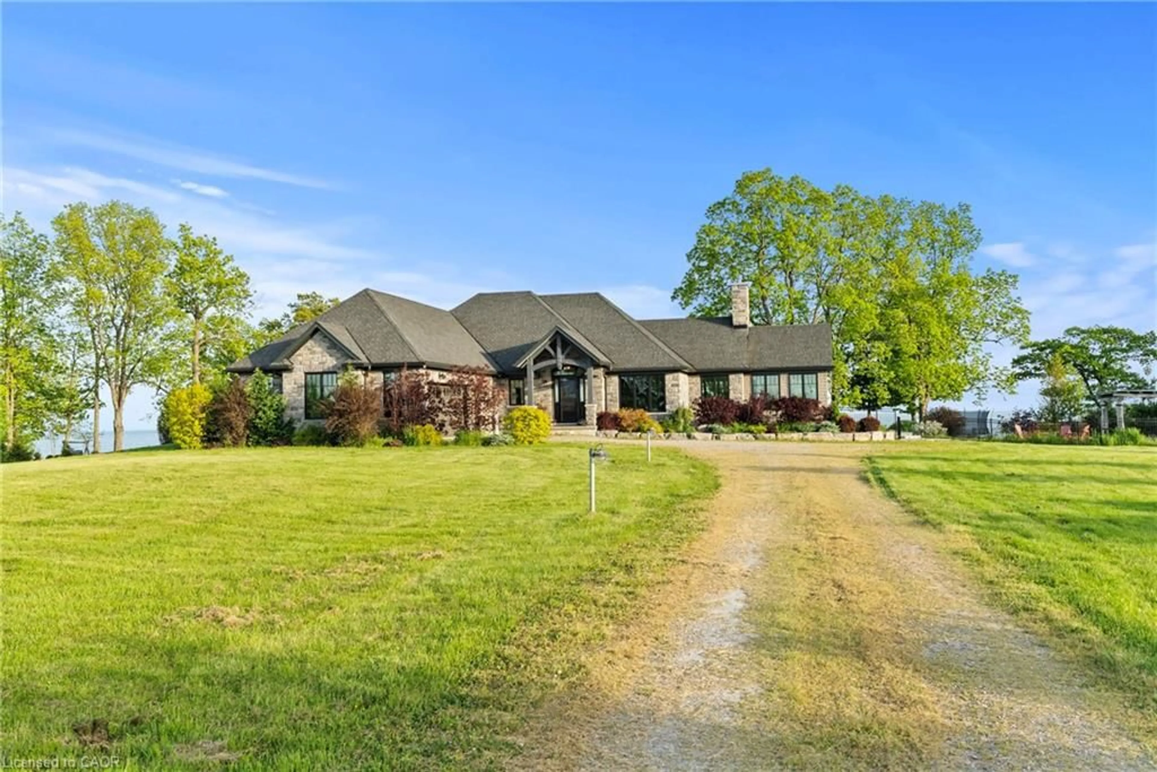 A pic from outside/outdoor area/front of a property/back of a property/a pic from drone, street for 515 Sandy Bay Rd, Dunnville Ontario N1A 2W6