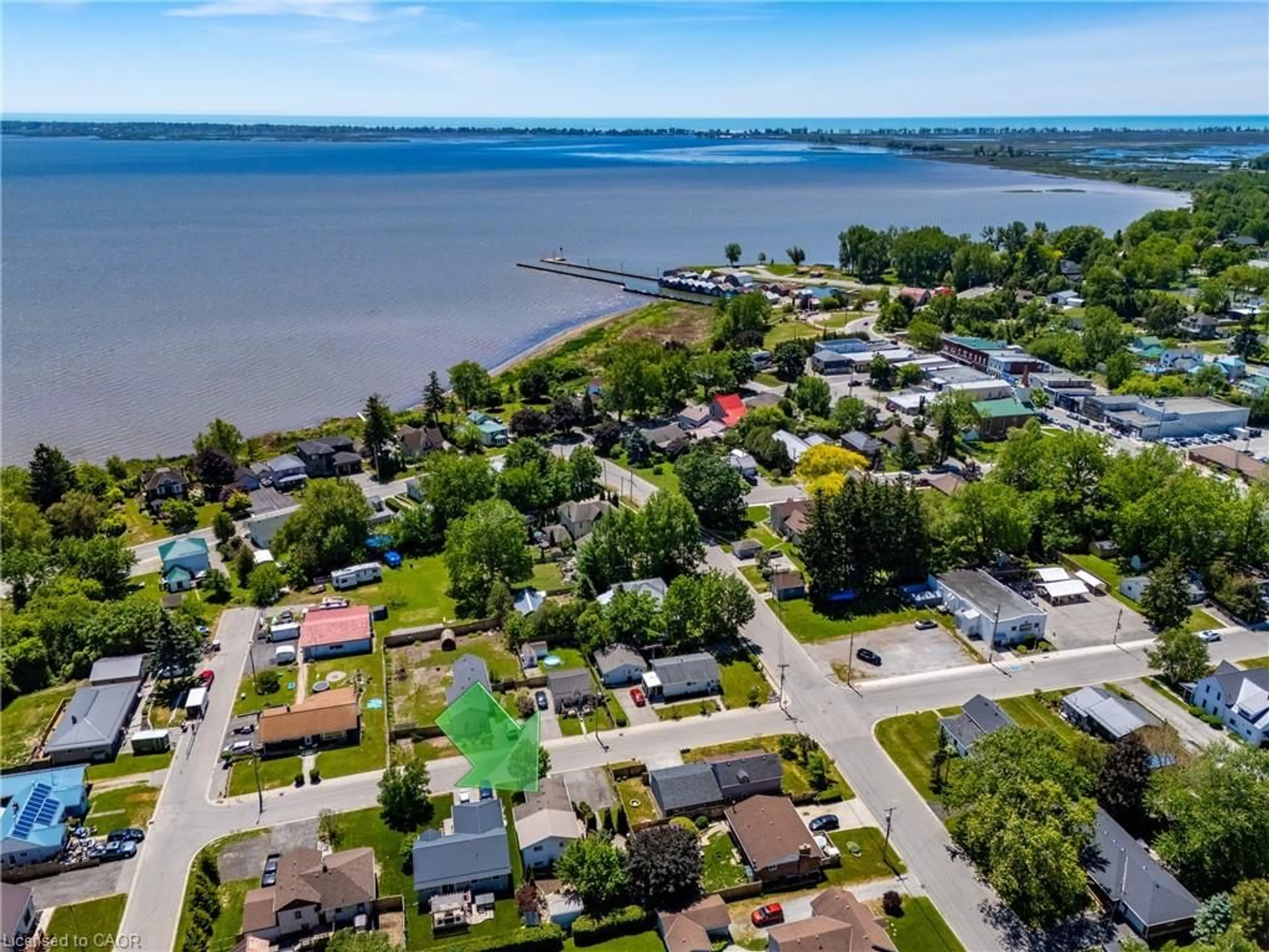A pic from outside/outdoor area/front of a property/back of a property/a pic from drone, water/lake/river/ocean view for 21 Centre St, Port Rowan Ontario N0E 1M0