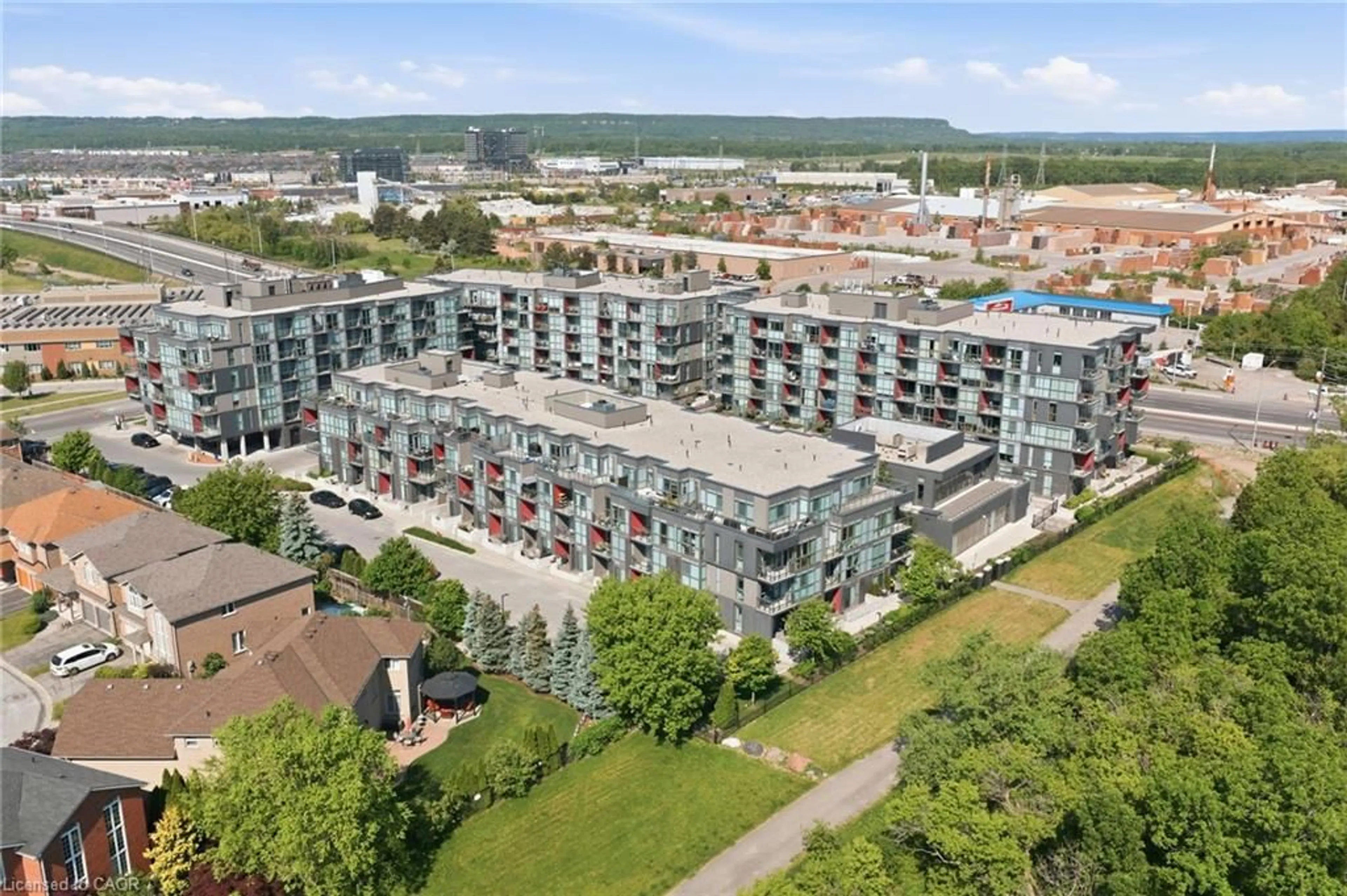 A pic from outside/outdoor area/front of a property/back of a property/a pic from drone, city buildings view from balcony for 5260 Dundas St #C212, Burlington Ontario L7L 0J7