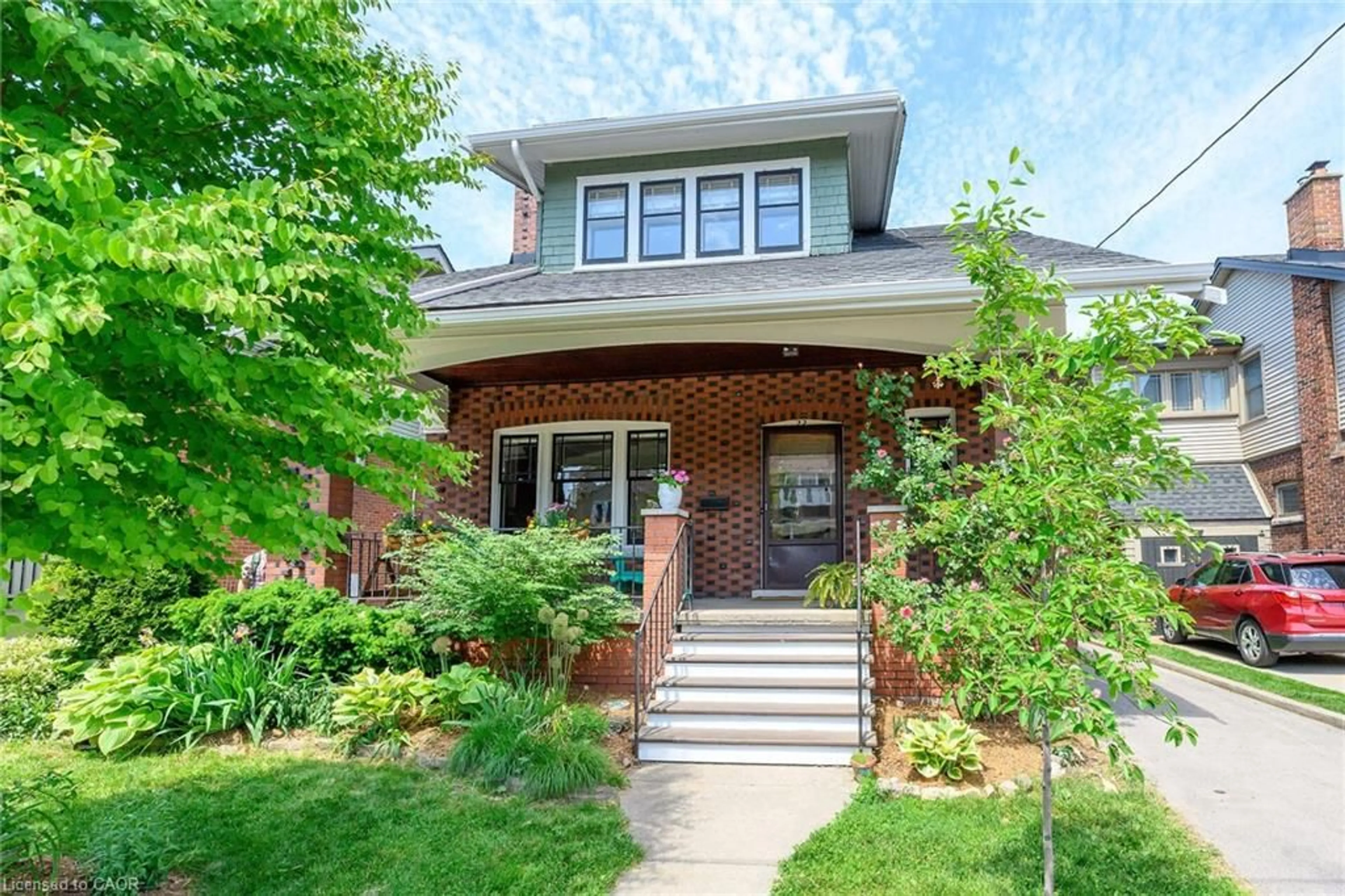Home with brick exterior material, street for 22 Connaught Ave, Hamilton Ontario L8M 3C2