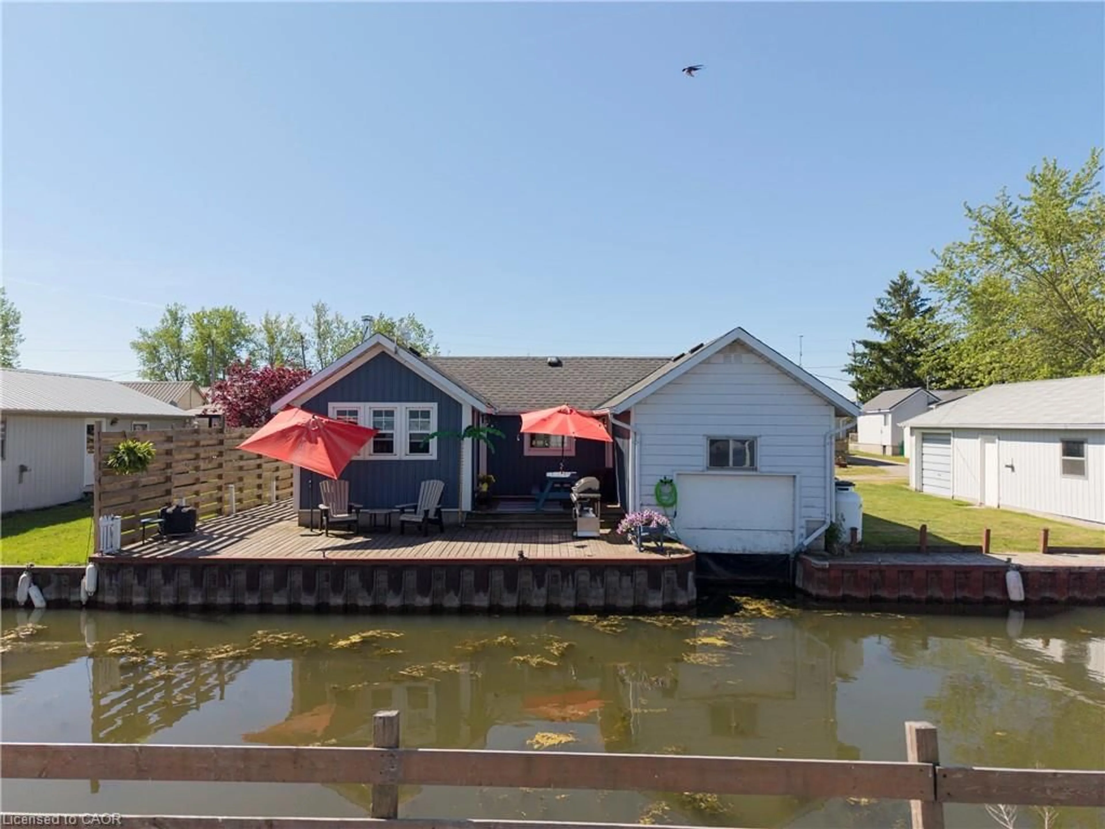 A pic from outside/outdoor area/front of a property/back of a property/a pic from drone, water/lake/river/ocean view for 44 Erie Blvd, Long Point Ontario N0E 1M0