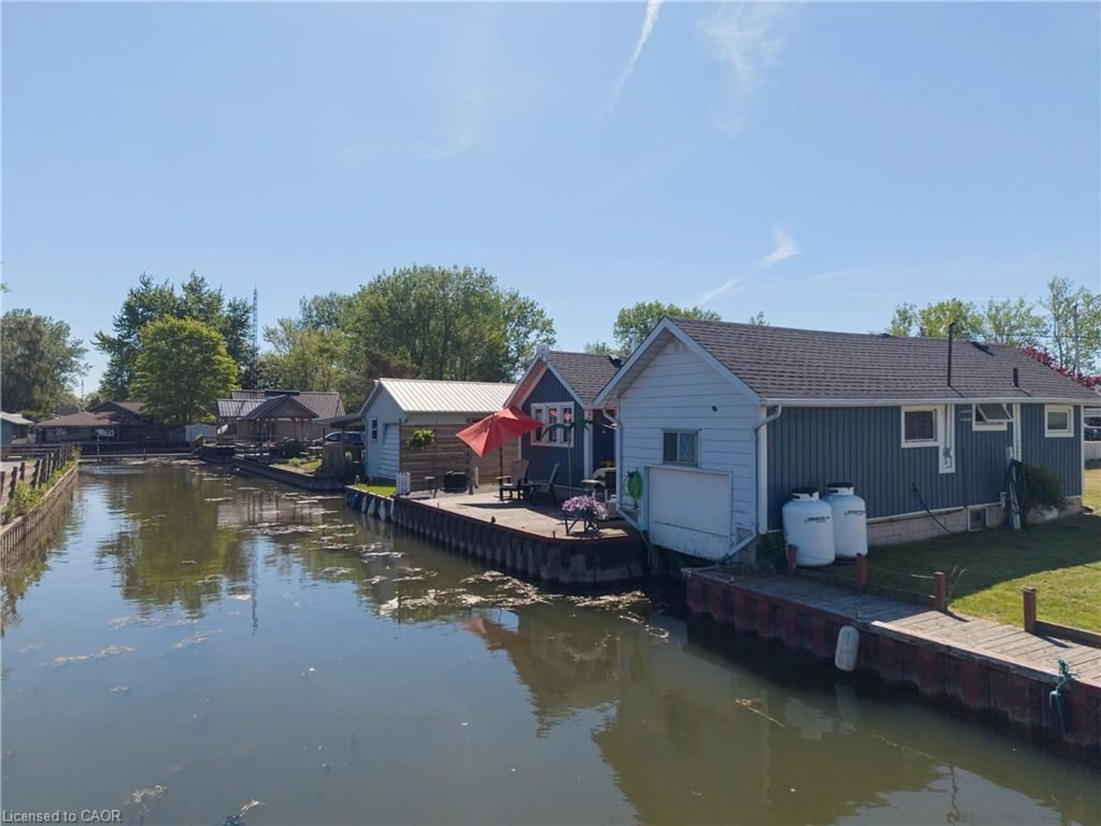 A pic from outside/outdoor area/front of a property/back of a property/a pic from drone, water/lake/river/ocean view for 44 Erie Blvd, Long Point Ontario N0E 1M0