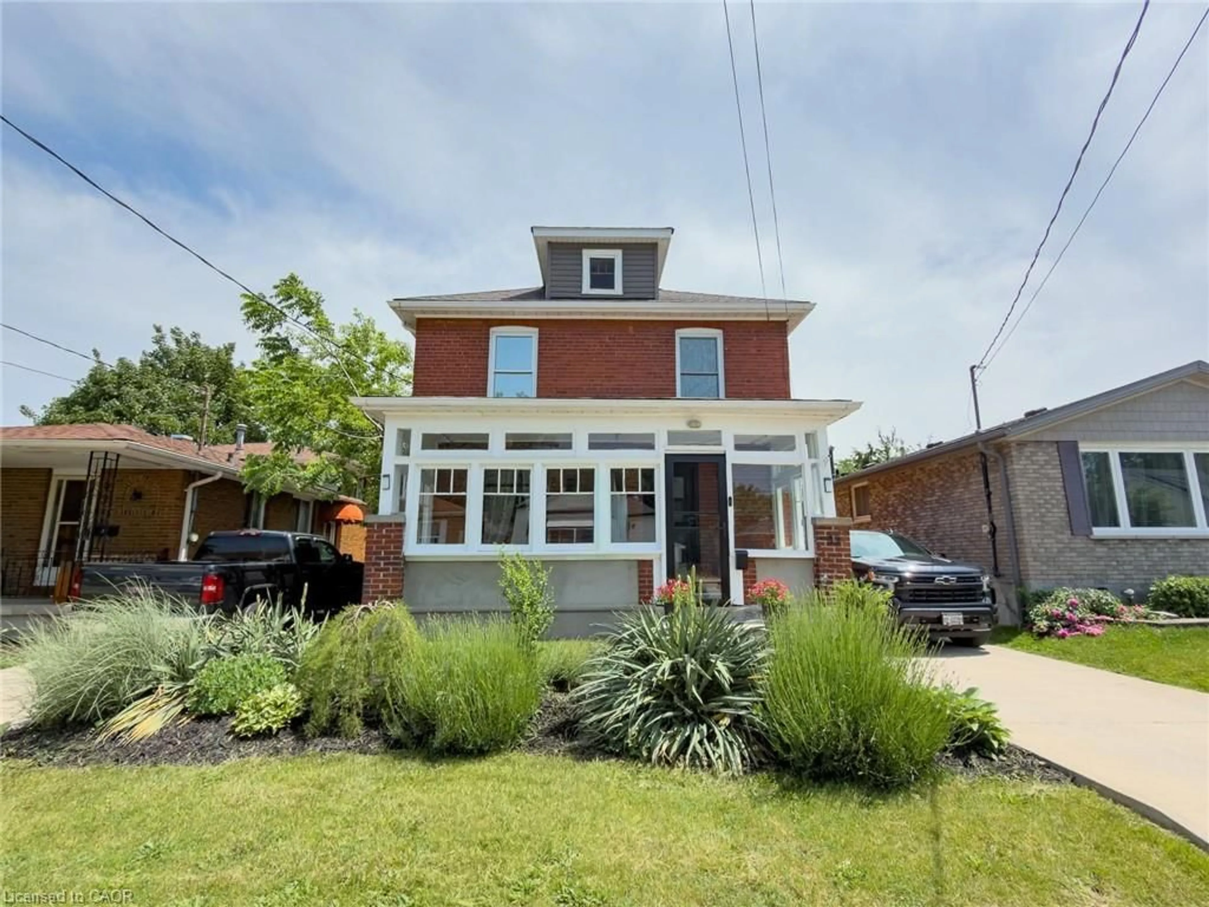 Home with brick exterior material, street for 32 Lorne St, St. Catharines Ontario L2P 3C7