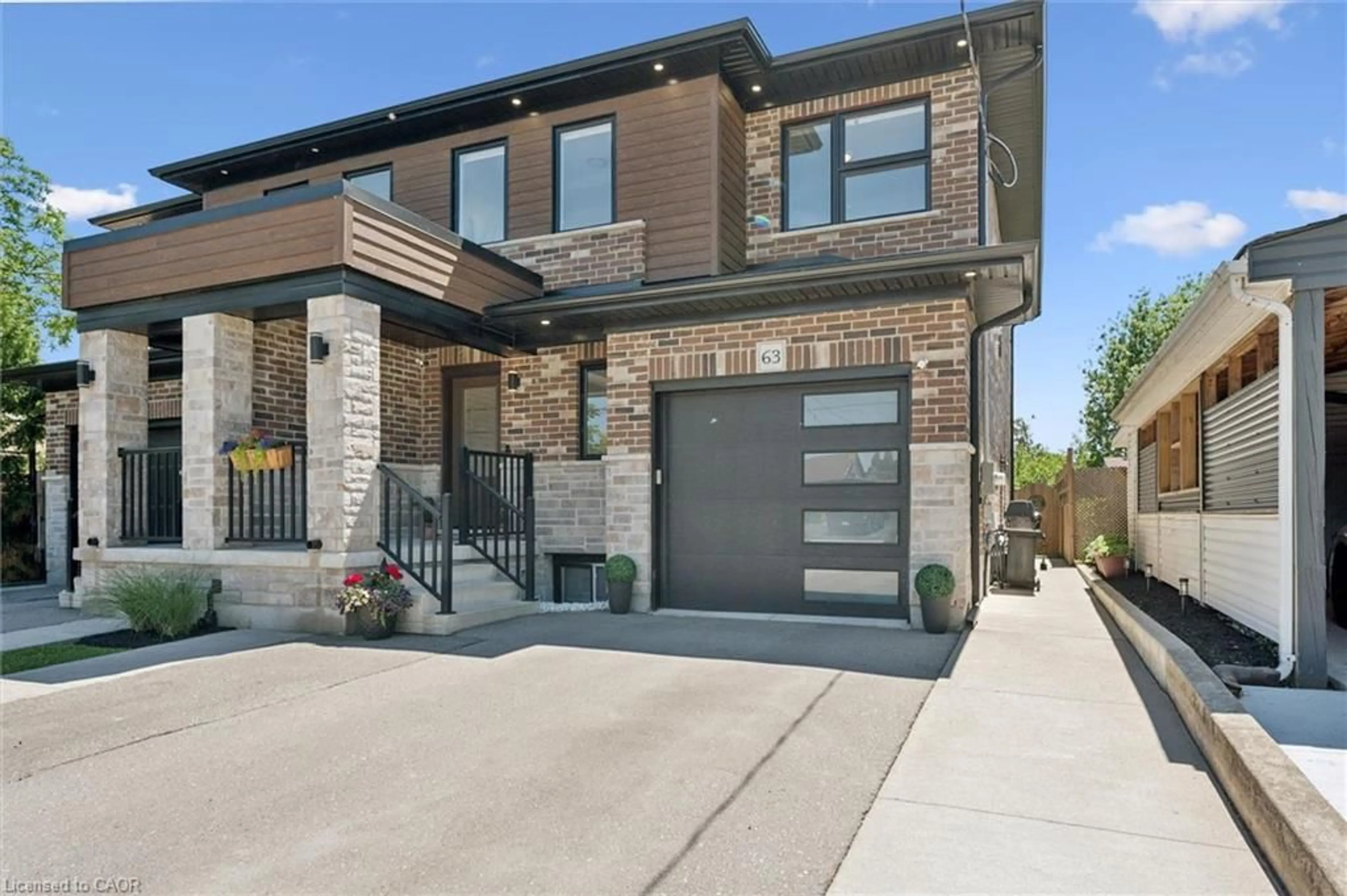 Home with brick exterior material, street for 63 Plymouth Rd, Kitchener Ontario N2G 3G7