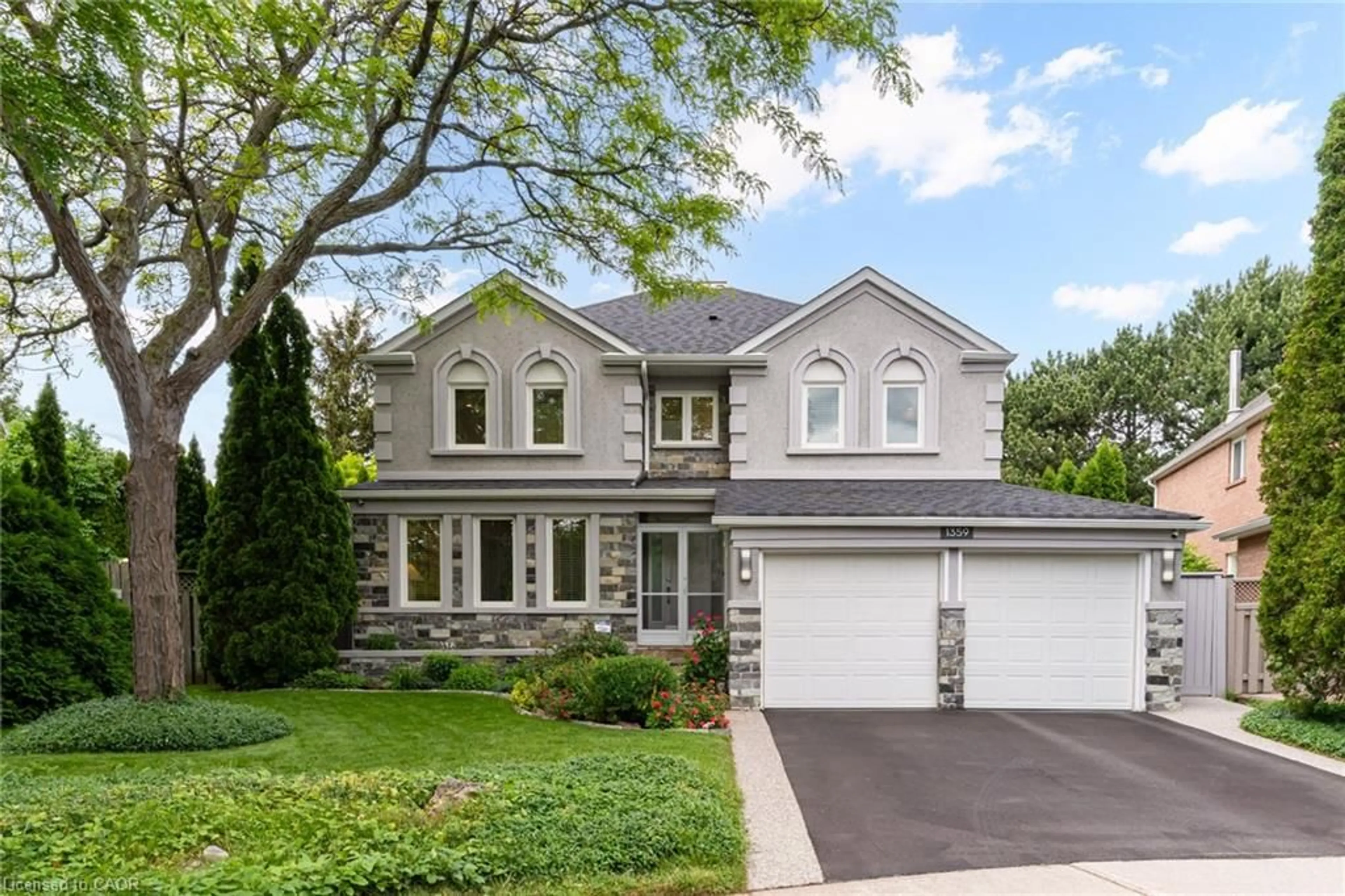 Home with vinyl exterior material, street for 1359 Saddler Cir, Oakville Ontario L6M 2X6