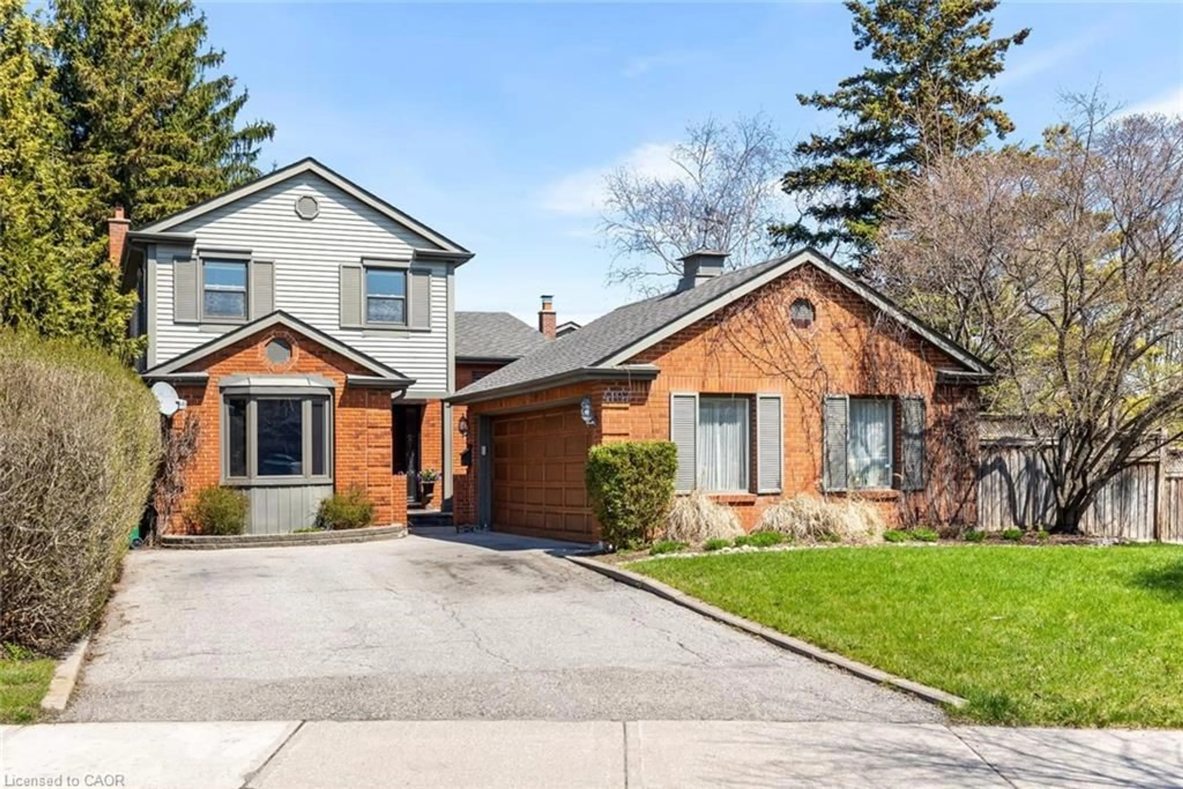 Home with brick exterior material, street for 4107 Rolling Valley Dr, Mississauga Ontario L5L 2J1