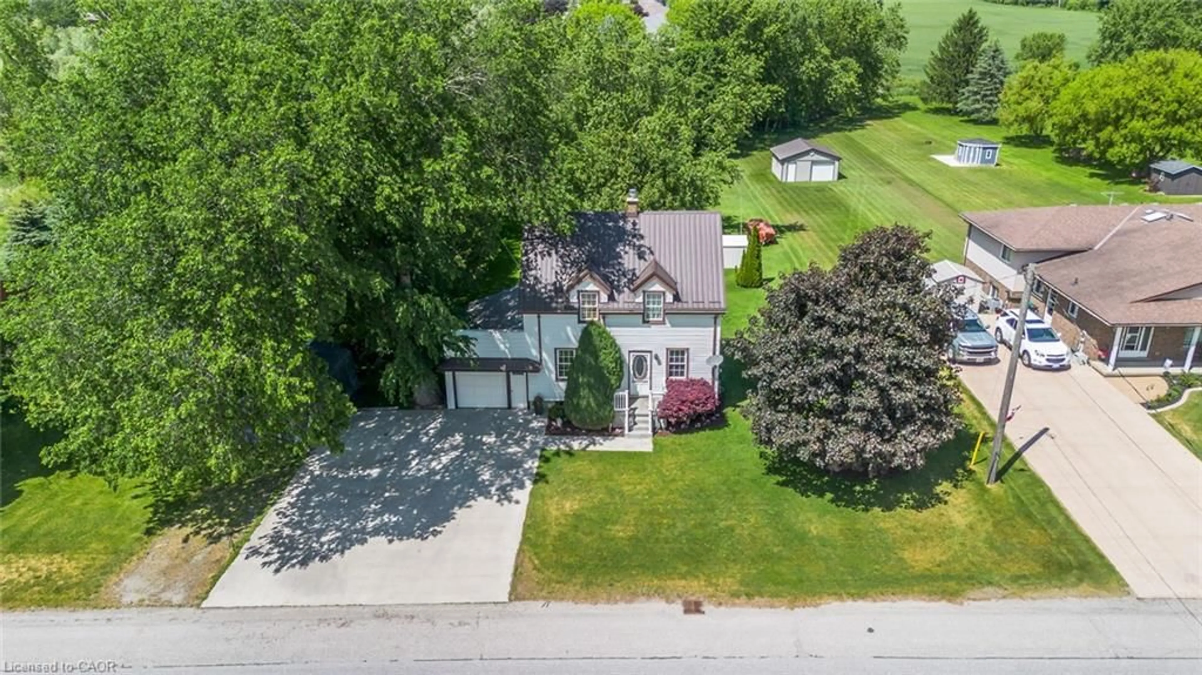 A pic from outside/outdoor area/front of a property/back of a property/a pic from drone, street for 3407 Lobsinger Line, St. Clements Ontario N0B 2M0