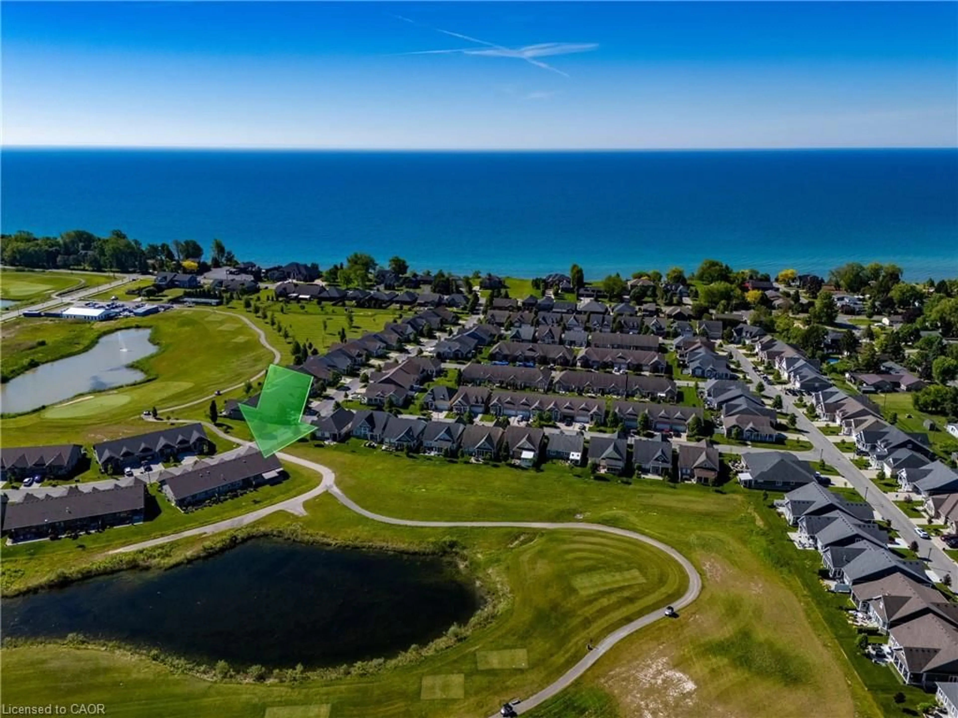A pic from outside/outdoor area/front of a property/back of a property/a pic from drone, water/lake/river/ocean view for 63 Regatta Dr, Port Dover Ontario N0A 1N3