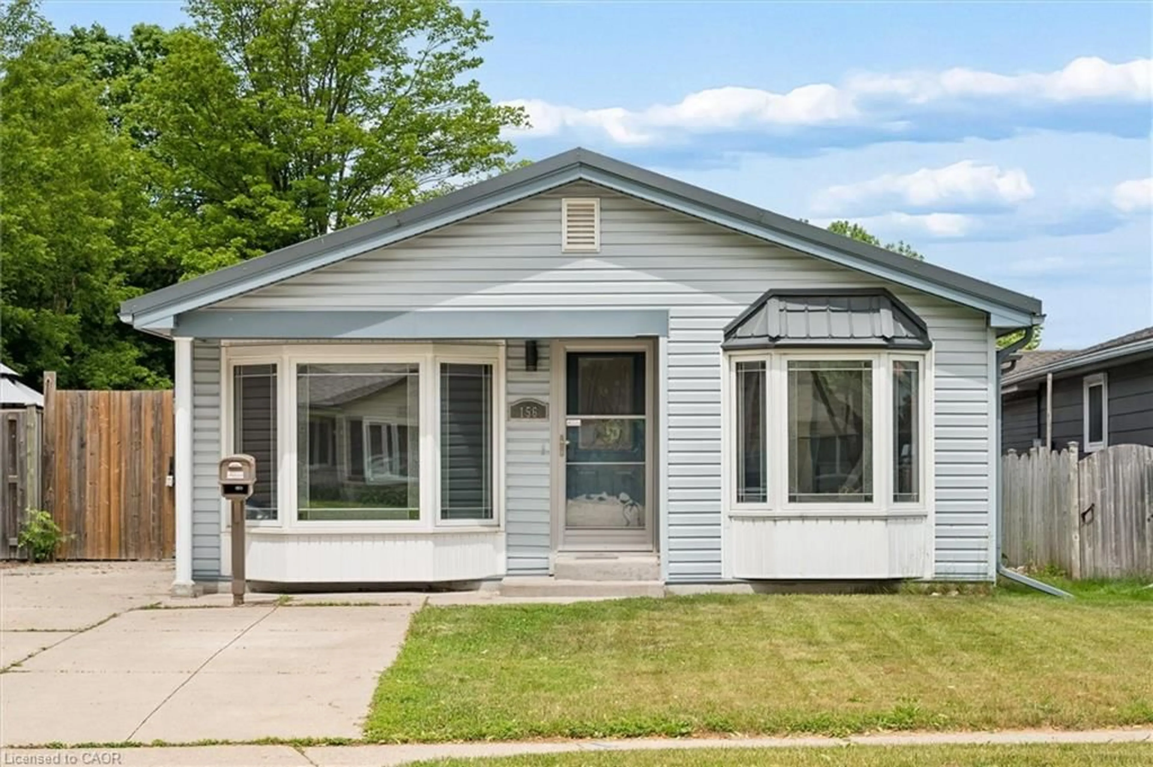 Home with vinyl exterior material, street for 156 Traynor Ave, Kitchener Ontario N2C 1W5